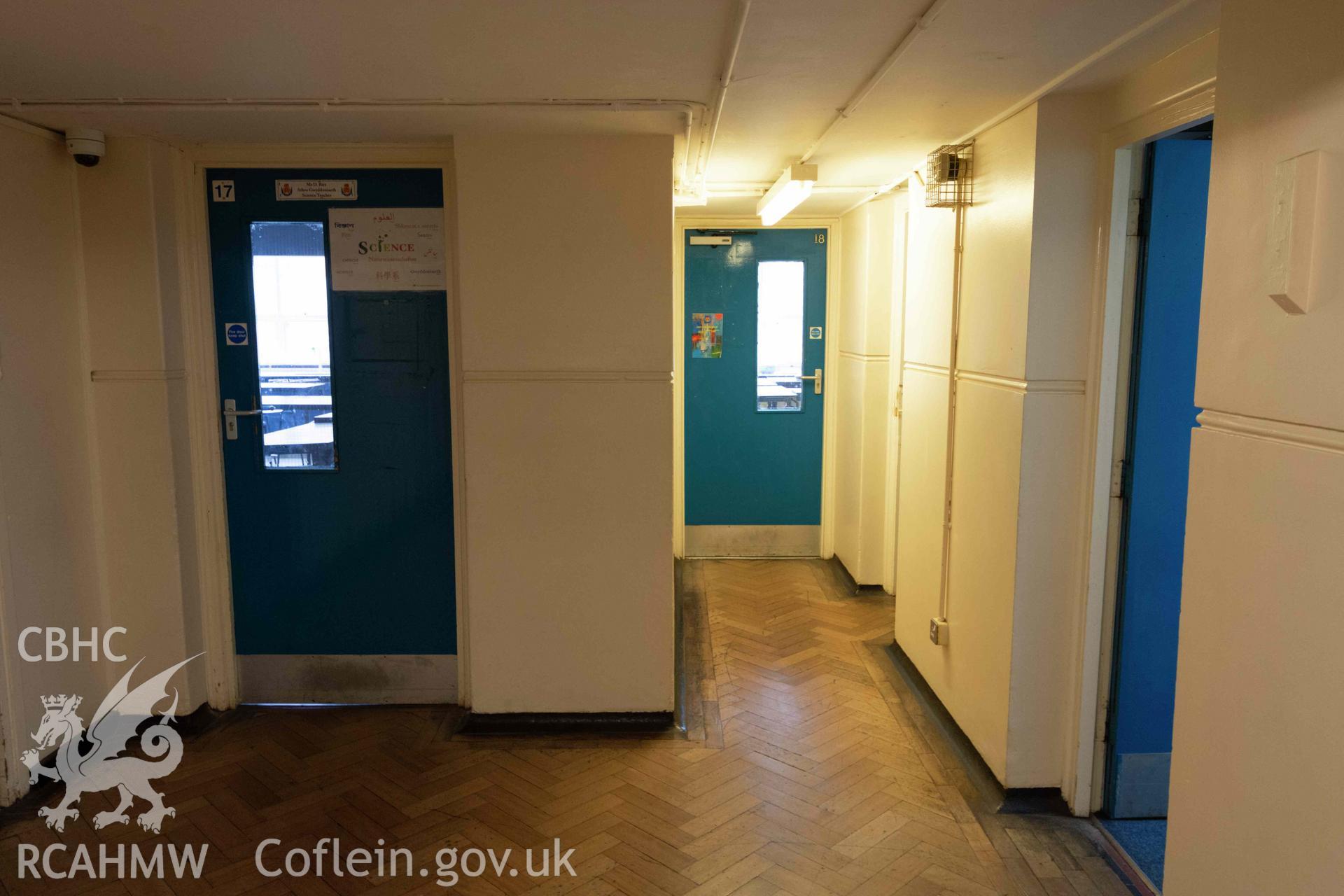Science rooms 17 and 18 doors. End of north east wing. Ground floor. Cathays High School