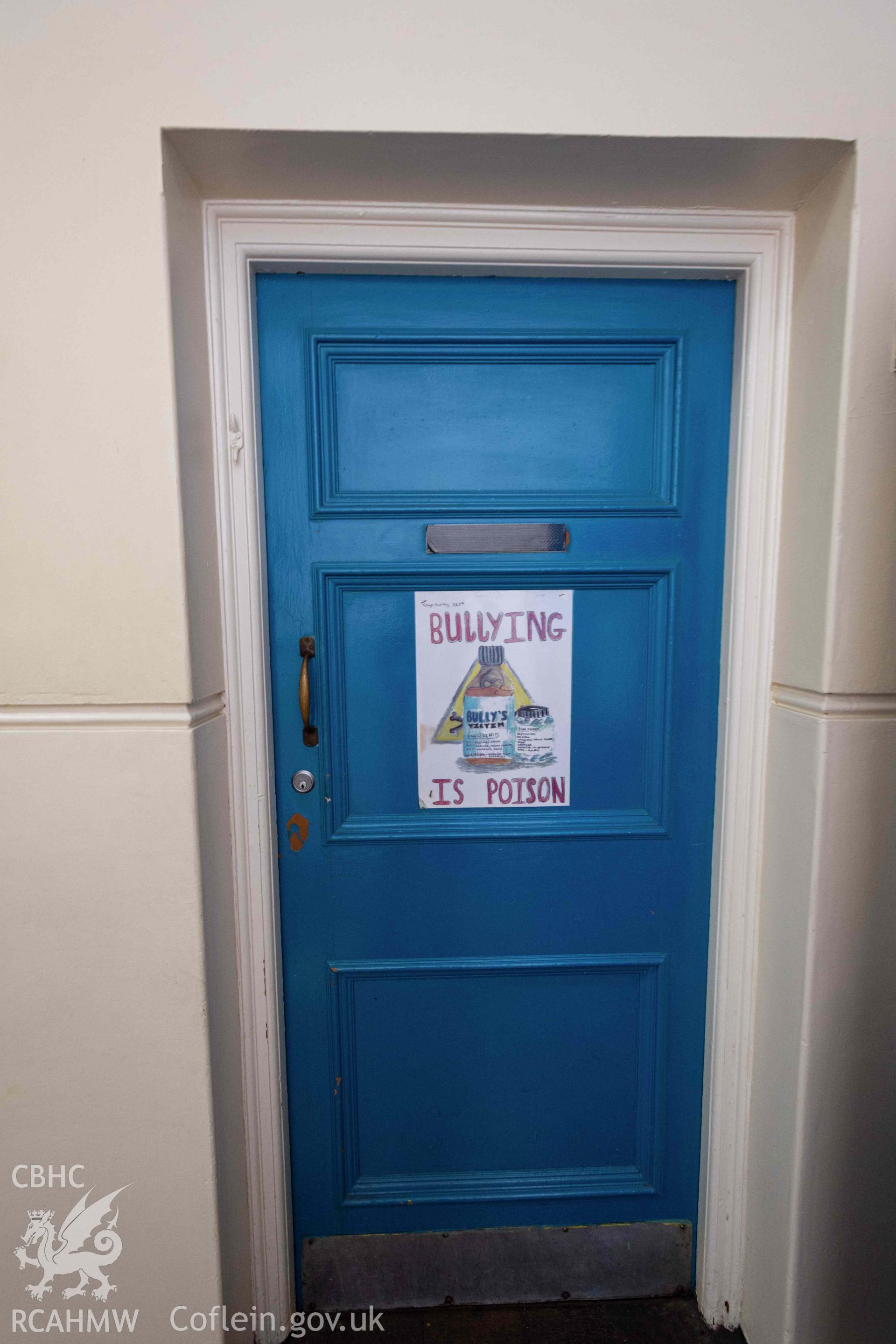 Bullying is poison' poster on door. Ground floor. Cathays High School