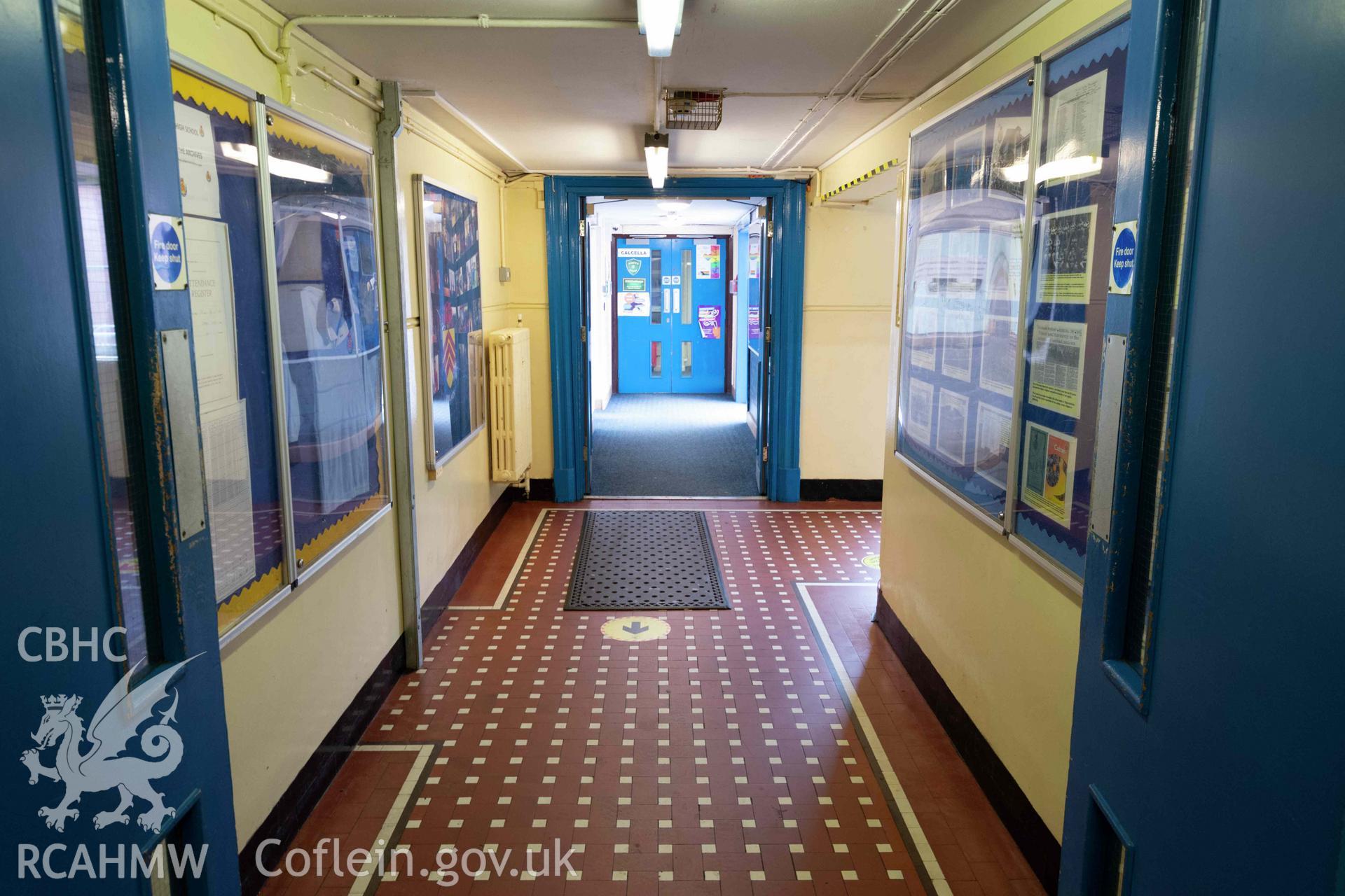 Doors and corridor towards Calcella. Visitors reception to the left. Ground floor. Cathays High School
