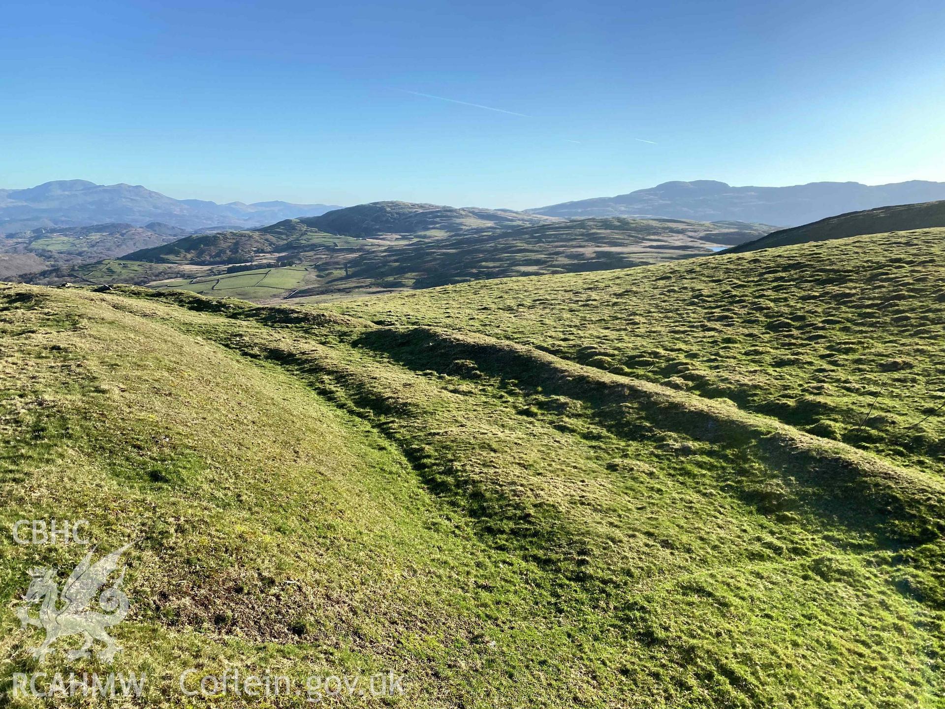 Digital photograph showing north east ramparts of Moel Goedog Hillfort, produced by Paul Davis in 2023