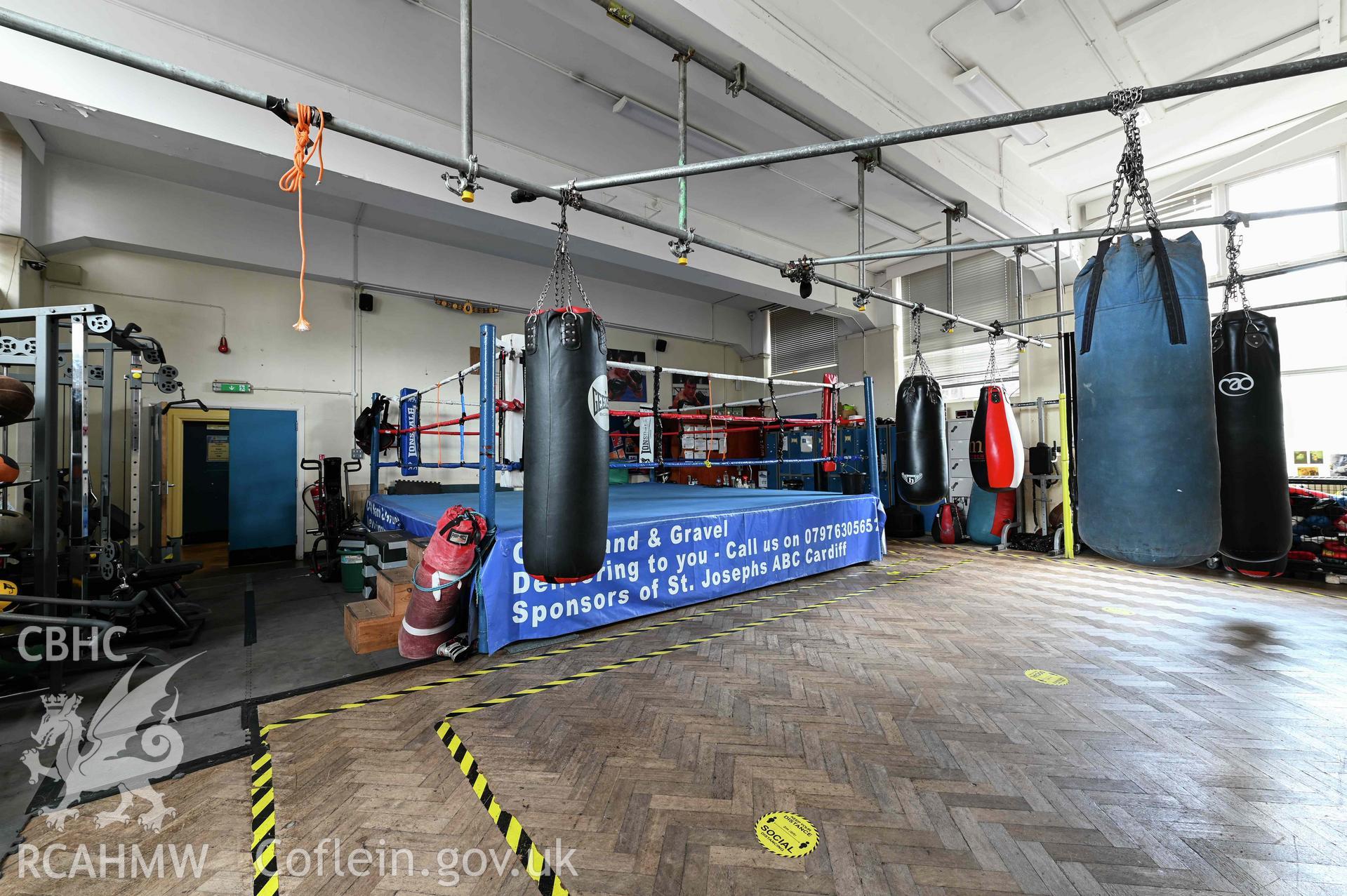 Lower hall boxing ring and punch bags. Ground floor. Cathays High School