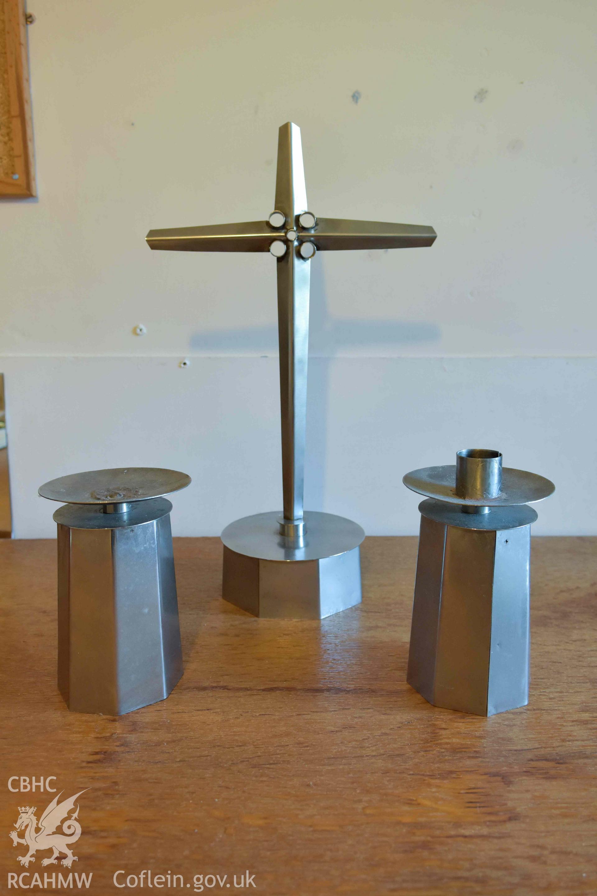 Altar cross and candlesticks in vestry