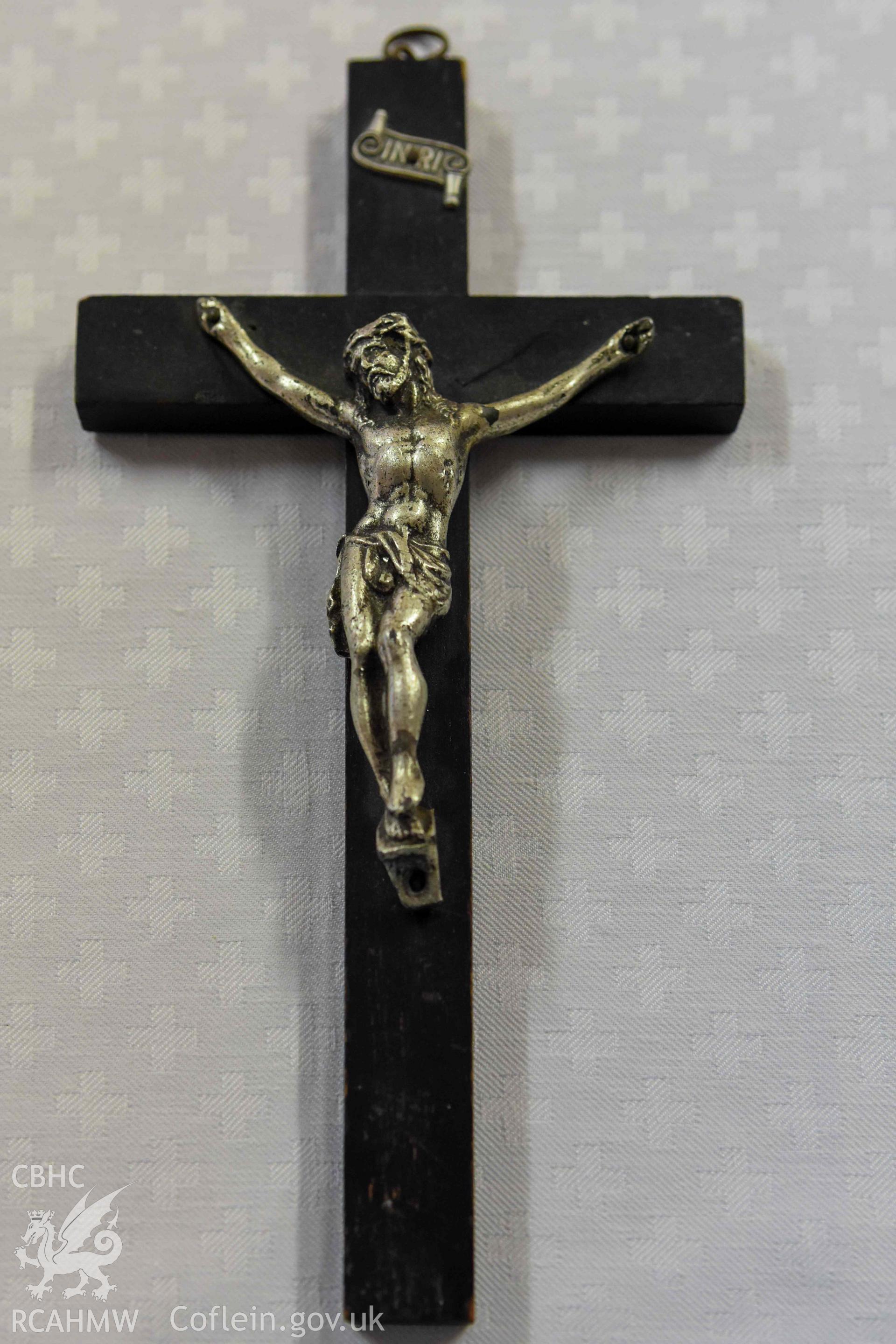 Crucifix on altar in church hall
