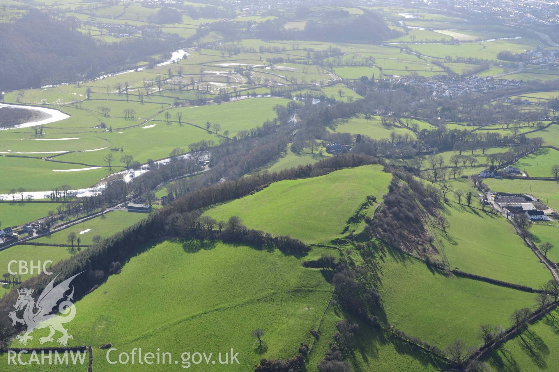 Merlin's Hill hillfort, wide view from the east. Oblique aerial photograph taken during the Royal Commission’s programme of archaeological aerial reconnaissance by Toby Driver on 14 March 2022.
