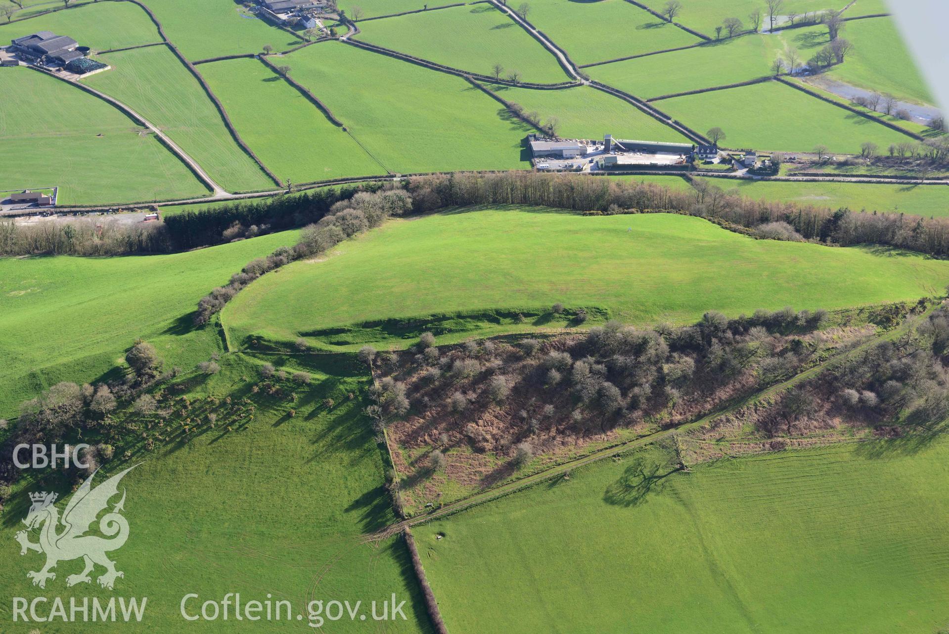 Merlin's Hill hillfort, wide view from the east. Oblique aerial photograph taken during the Royal Commission’s programme of archaeological aerial reconnaissance by Toby Driver on 14 March 2022.