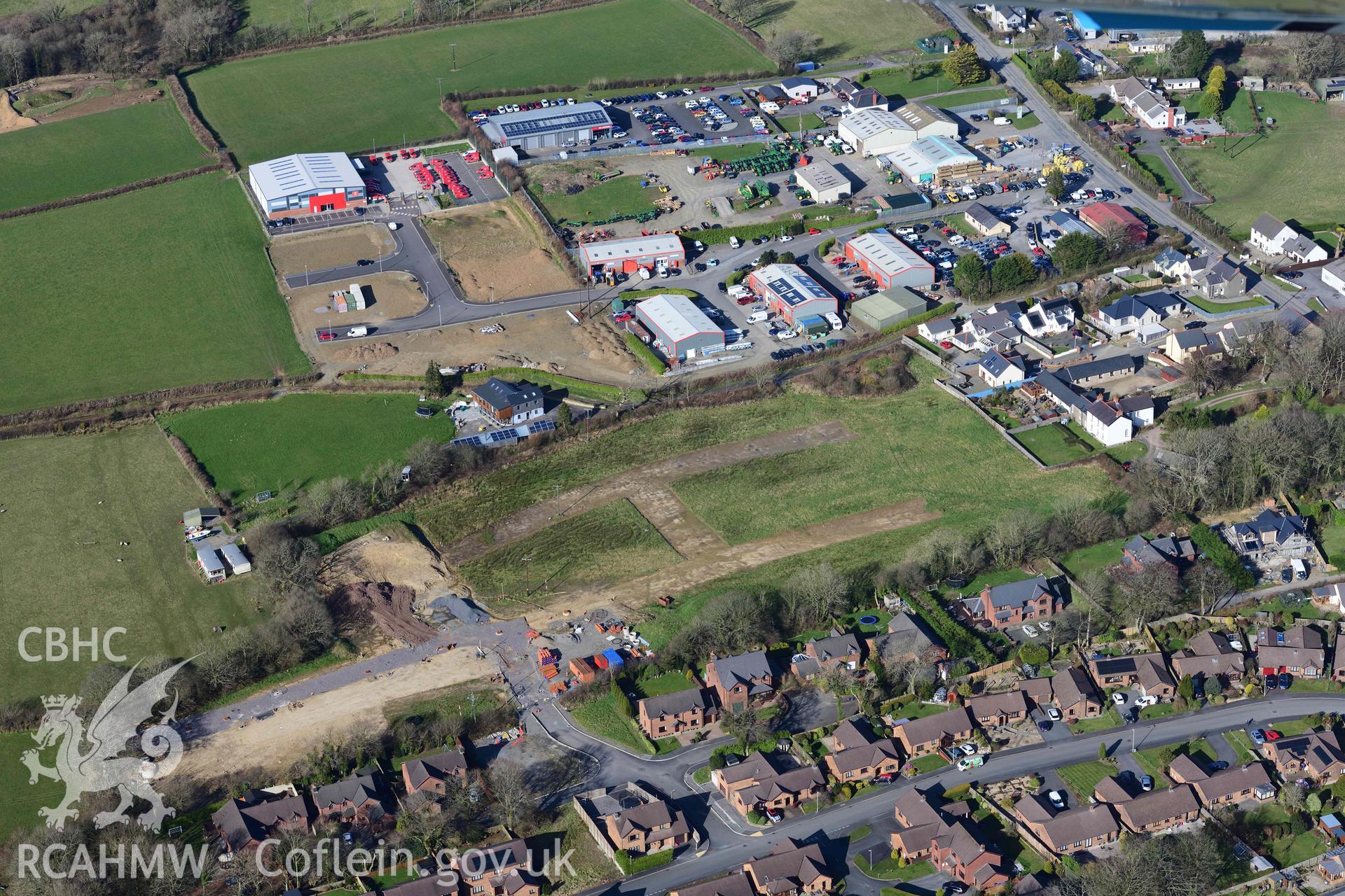 Redstone Cross, Narberth, archaeological evaluation. Oblique aerial photograph taken during the Royal Commission’s programme of archaeological aerial reconnaissance by Toby Driver on 14 March 2022.