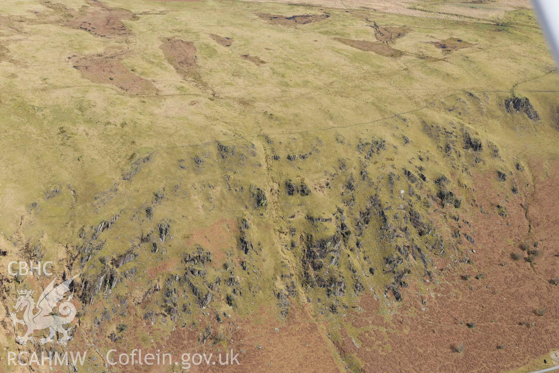 Esgair Irfon cairn, general view of location. Oblique aerial photograph taken during the Royal Commission’s programme of archaeological aerial reconnaissance by Toby Driver on 14 March 2022.