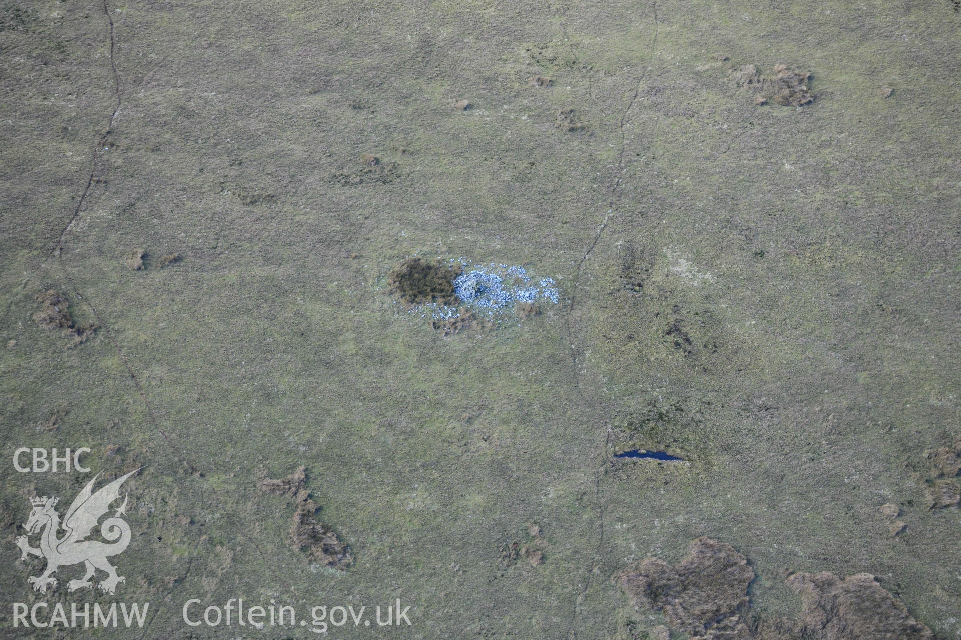 Darren stone pair and cairns, view from the south. Oblique aerial photograph taken during the Royal Commission’s programme of archaeological aerial reconnaissance by Toby Driver on 14 March 2022.