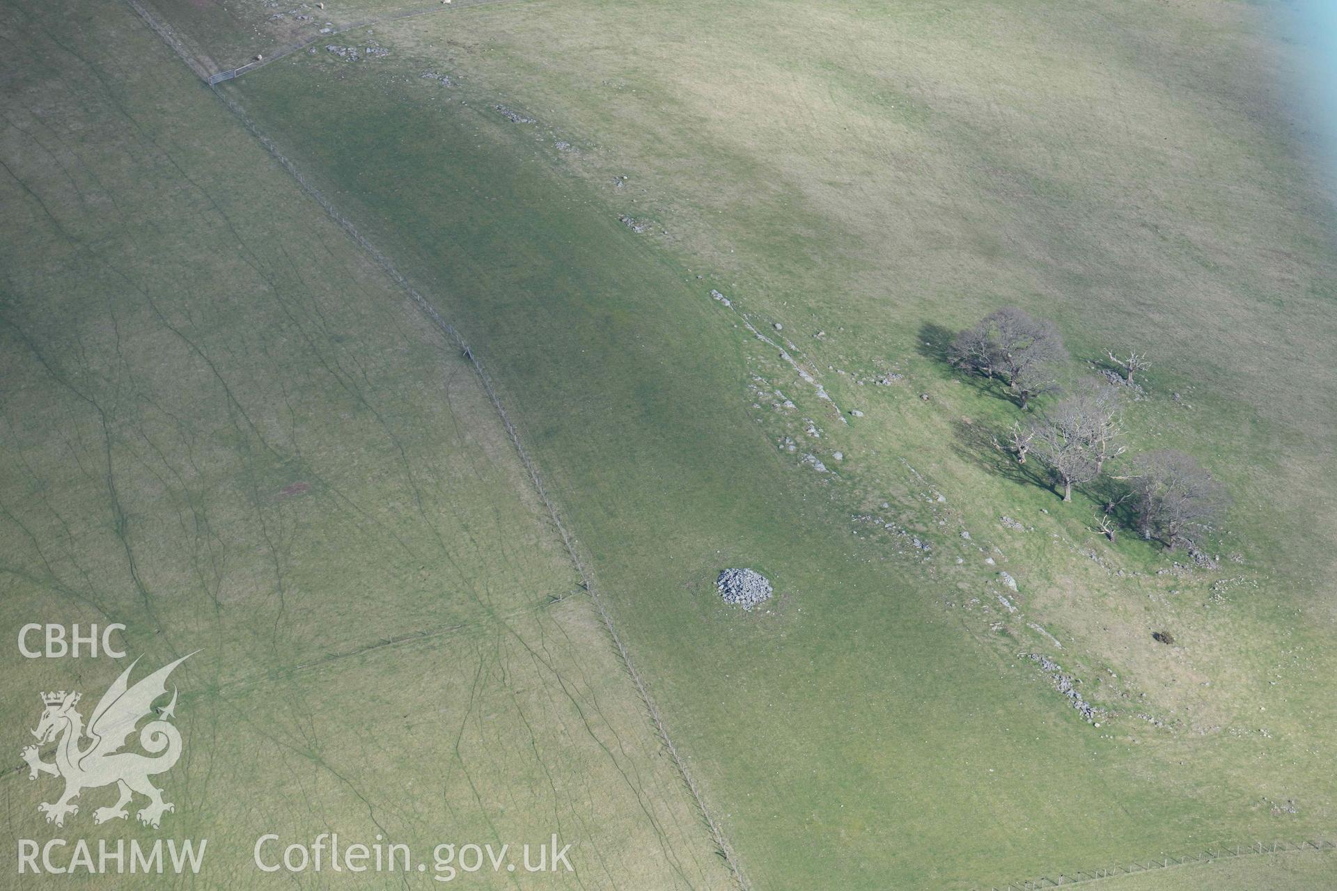 Dol y Fan cairn. Oblique aerial photograph taken during the Royal Commission’s programme of archaeological aerial reconnaissance by Toby Driver on 14 March 2022.
