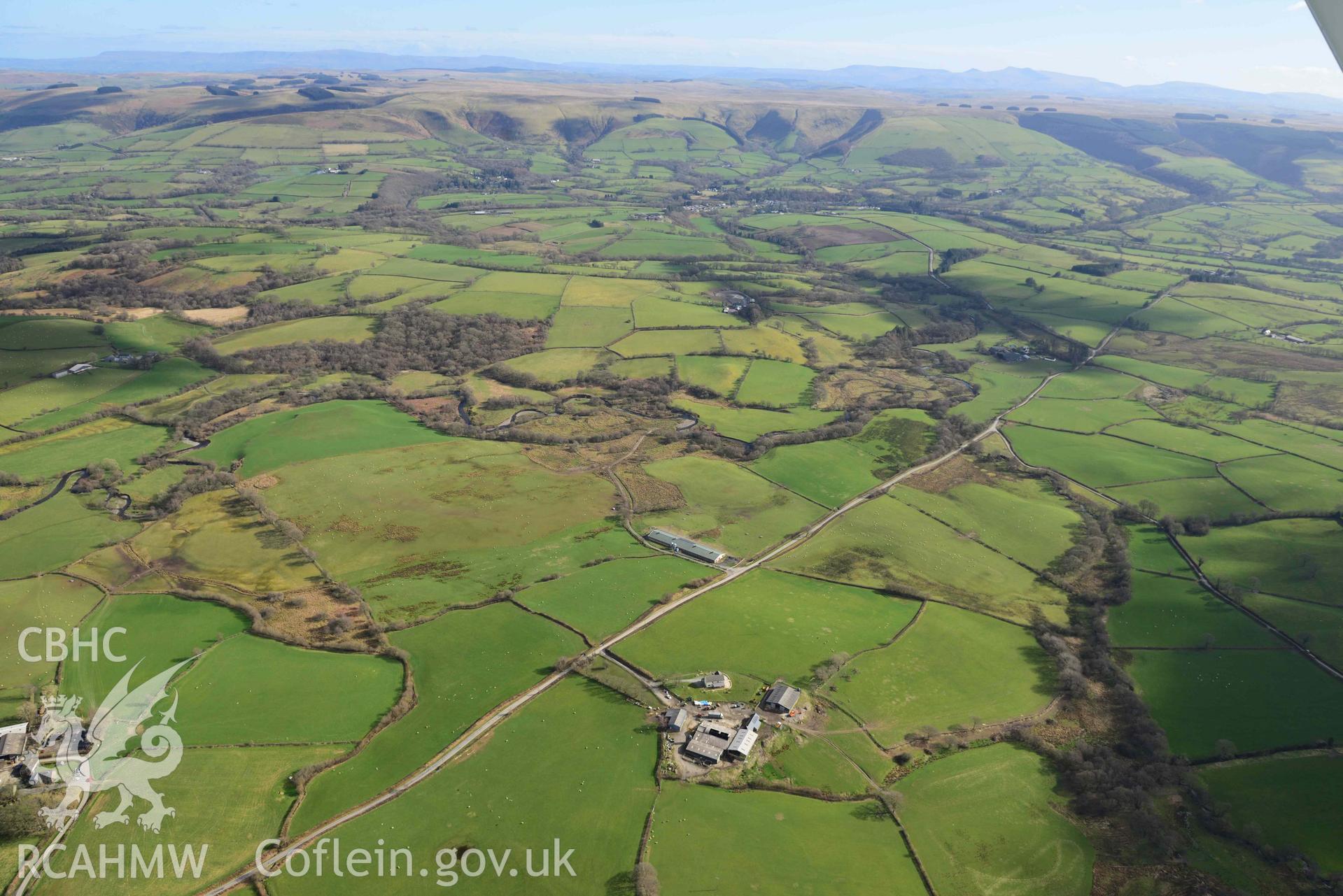 Llwyncadwgan, Roman road south to Glancamddwr. Oblique aerial photograph taken during the Royal Commission’s programme of archaeological aerial reconnaissance by Toby Driver on 14 March 2022.
