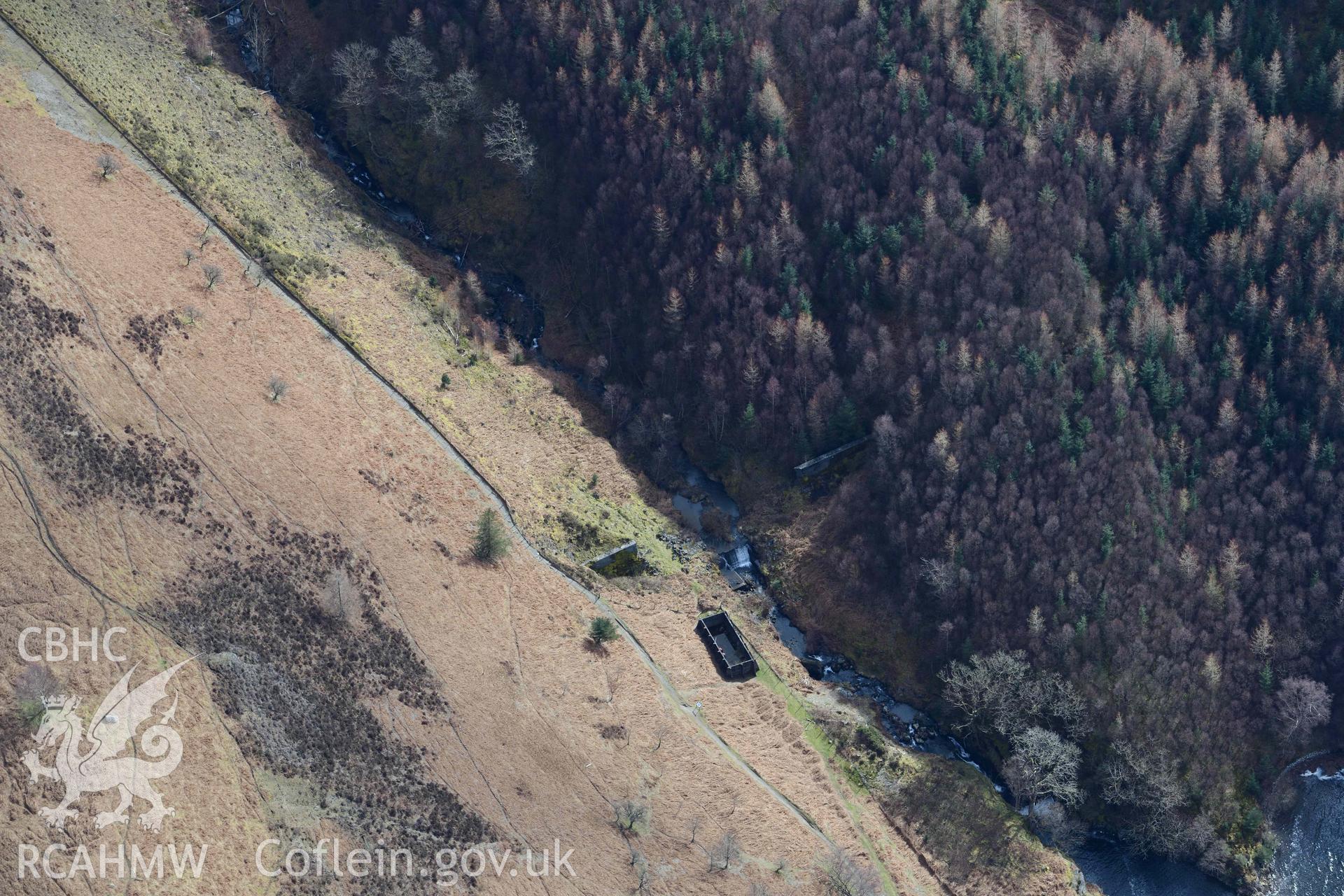 Nant y Gro dam. Oblique aerial photograph taken during the Royal Commission’s programme of archaeological aerial reconnaissance by Toby Driver on 14 March 2022.