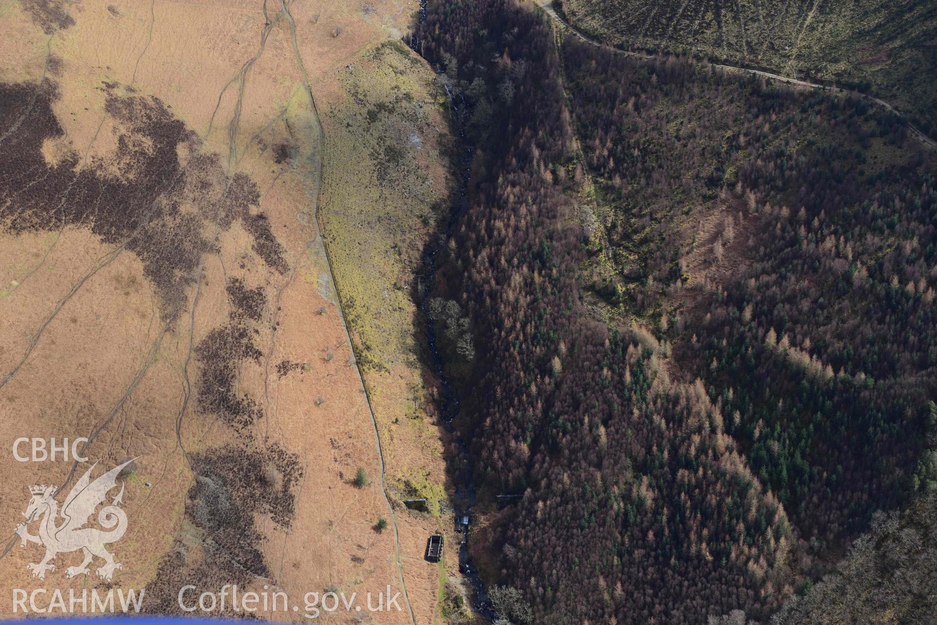 Nant y Gro dam. Oblique aerial photograph taken during the Royal Commission’s programme of archaeological aerial reconnaissance by Toby Driver on 14 March 2022.