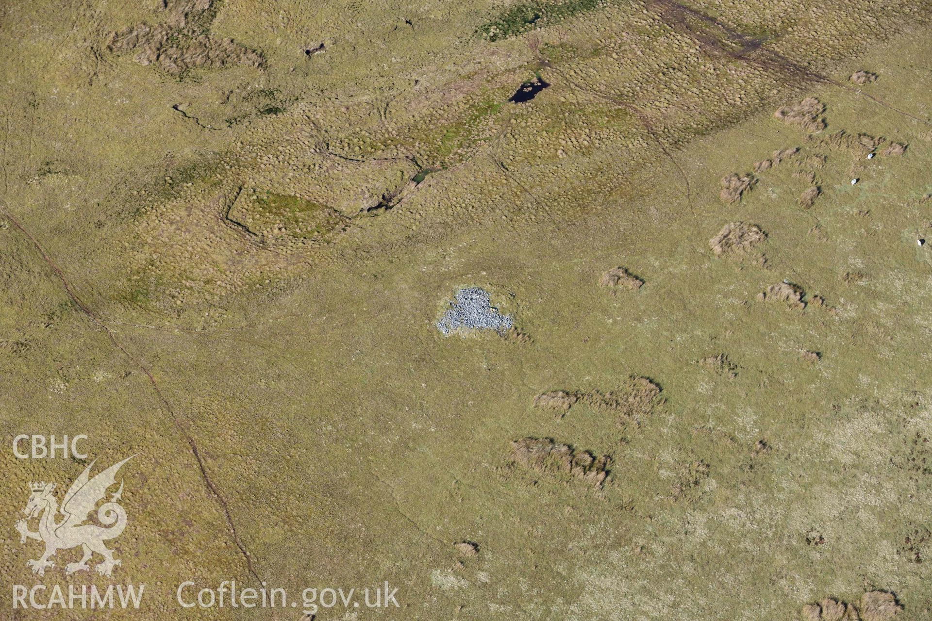 Gurnos ring cairn. Oblique aerial photograph taken during the Royal Commission’s programme of archaeological aerial reconnaissance by Toby Driver on 14 March 2022.