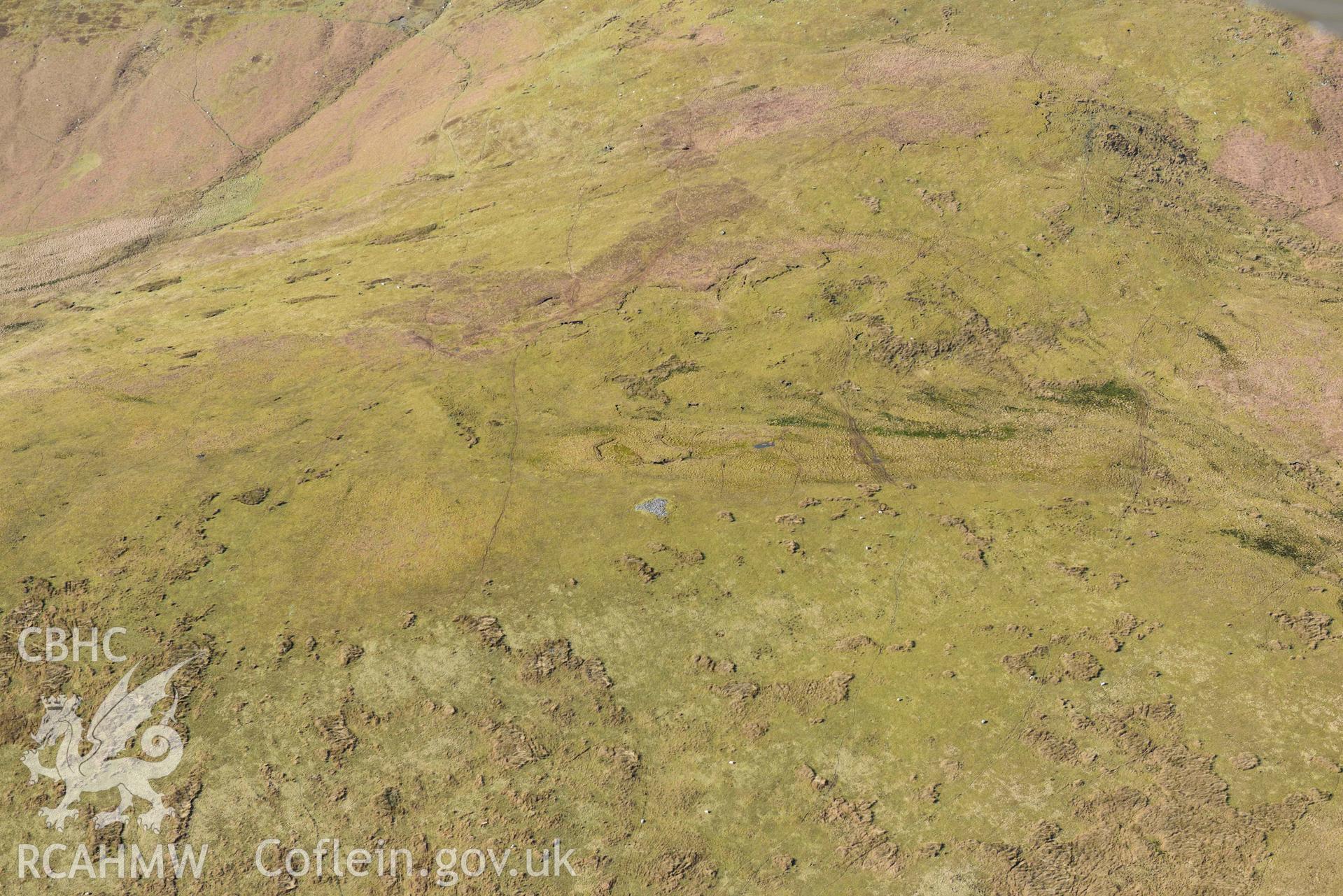 Gurnos ring cairn. Oblique aerial photograph taken during the Royal Commission’s programme of archaeological aerial reconnaissance by Toby Driver on 14 March 2022.