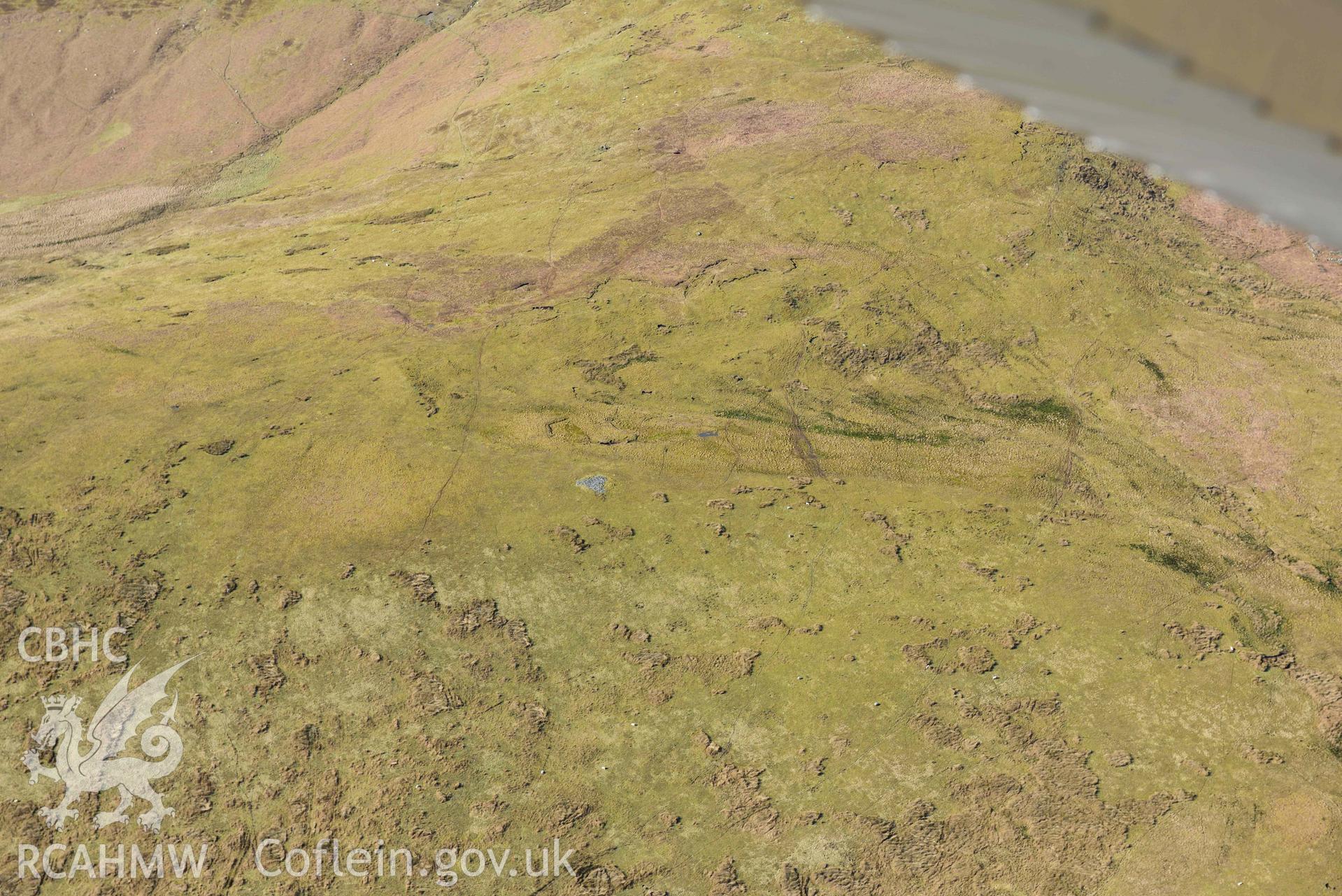 Gurnos ring cairn. Oblique aerial photograph taken during the Royal Commission’s programme of archaeological aerial reconnaissance by Toby Driver on 14 March 2022.