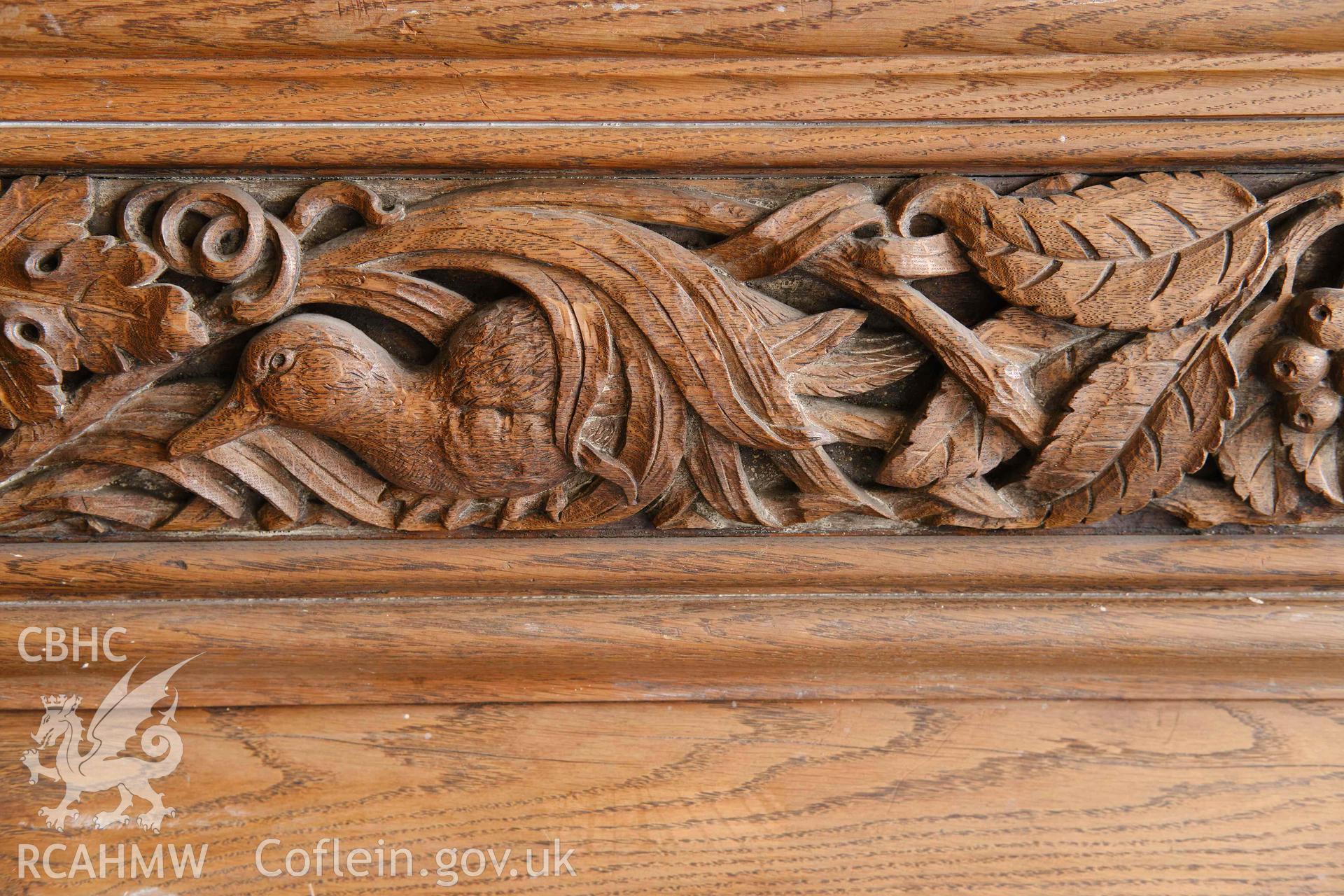 First floor: detail of timber frieze over fireplace