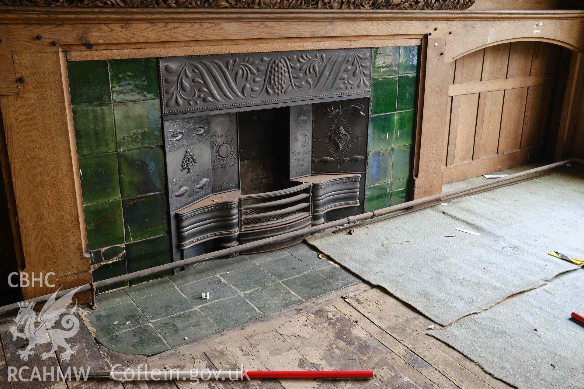 First floor: tiled floor in front of fireplace