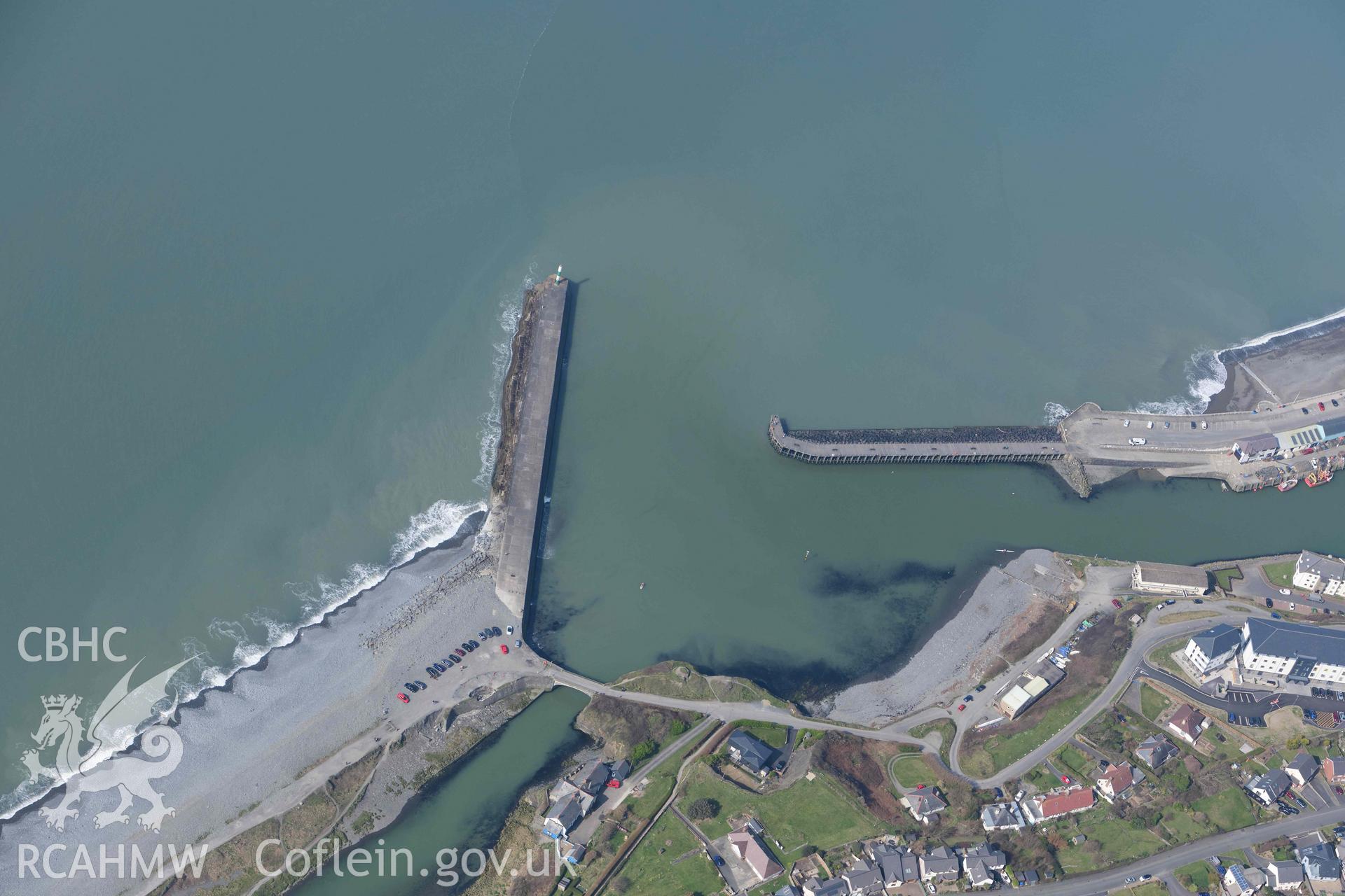 Aberystwyth Harbour entrance. Oblique aerial photographs taken during the Royal Commission’s programme of archaeological aerial reconnaissance by Toby Driver on 25 March 2022.