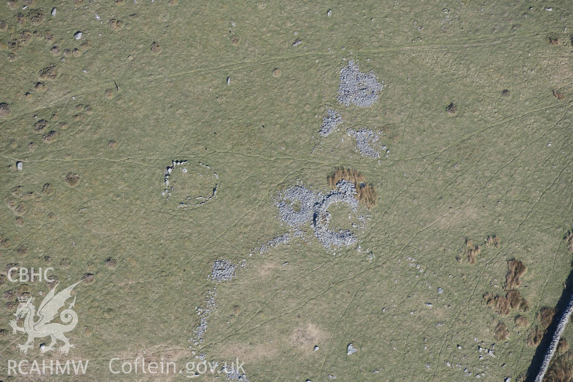 Mynydd Egryn hut circle settlement and Hengwm cairn circle. Oblique aerial photographs taken during the Royal Commission’s programme of archaeological aerial reconnaissance by Toby Driver on 25 March 2022.