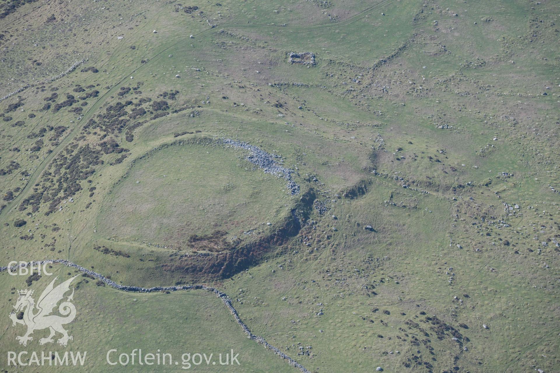 Pen y Dinas Hillfort. Oblique aerial photographs taken during the Royal Commission’s programme of archaeological aerial reconnaissance by Toby Driver on 25 March 2022.