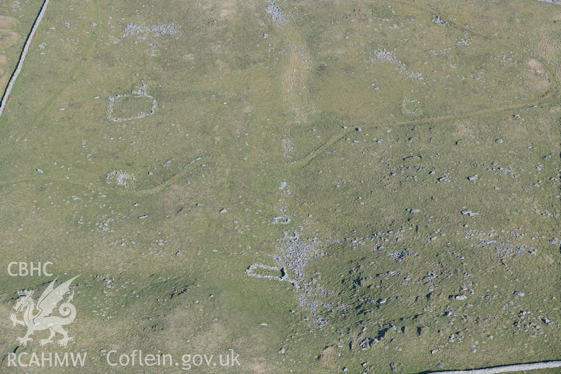 Bwlch Cwmmaria, varied settlement features and enclosures. Oblique aerial photographs taken during the Royal Commission’s programme of archaeological aerial reconnaissance by Toby Driver on 25 March 2022.