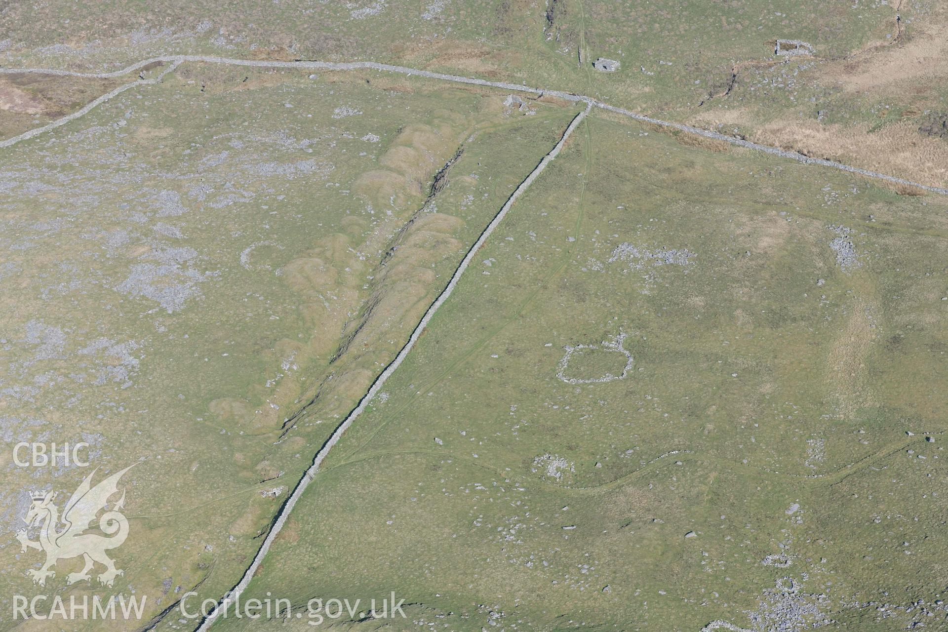 Bwlch Cwmmaria, varied settlement features and enclosures. Oblique aerial photographs taken during the Royal Commission’s programme of archaeological aerial reconnaissance by Toby Driver on 25 March 2022.