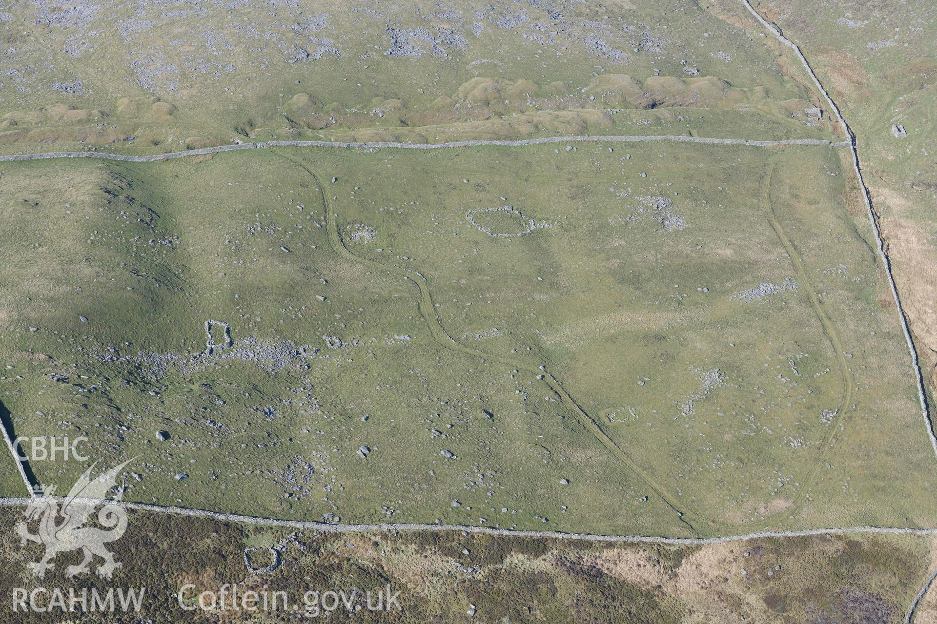 Bwlch Cwmmaria, varied settlement features and enclosures. Oblique aerial photographs taken during the Royal Commission’s programme of archaeological aerial reconnaissance by Toby Driver on 25 March 2022.