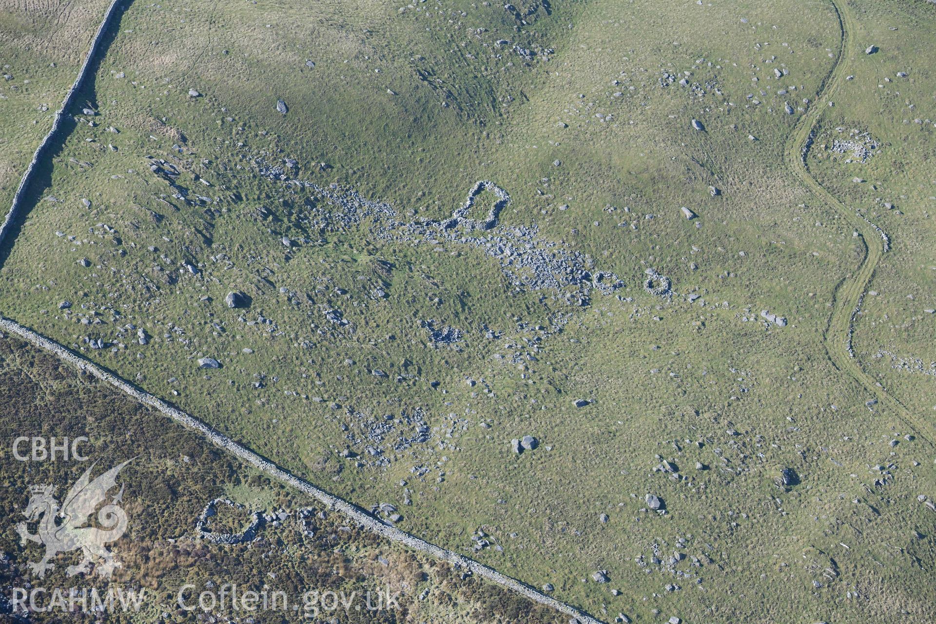 Bwlch Cwmmaria, varied settlement features and enclosures. Oblique aerial photographs taken during the Royal Commission’s programme of archaeological aerial reconnaissance by Toby Driver on 25 March 2022.