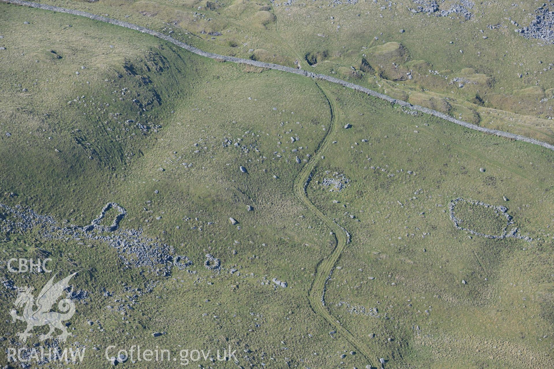 Bwlch Cwmmaria, varied settlement features and enclosures. Oblique aerial photographs taken during the Royal Commission’s programme of archaeological aerial reconnaissance by Toby Driver on 25 March 2022.