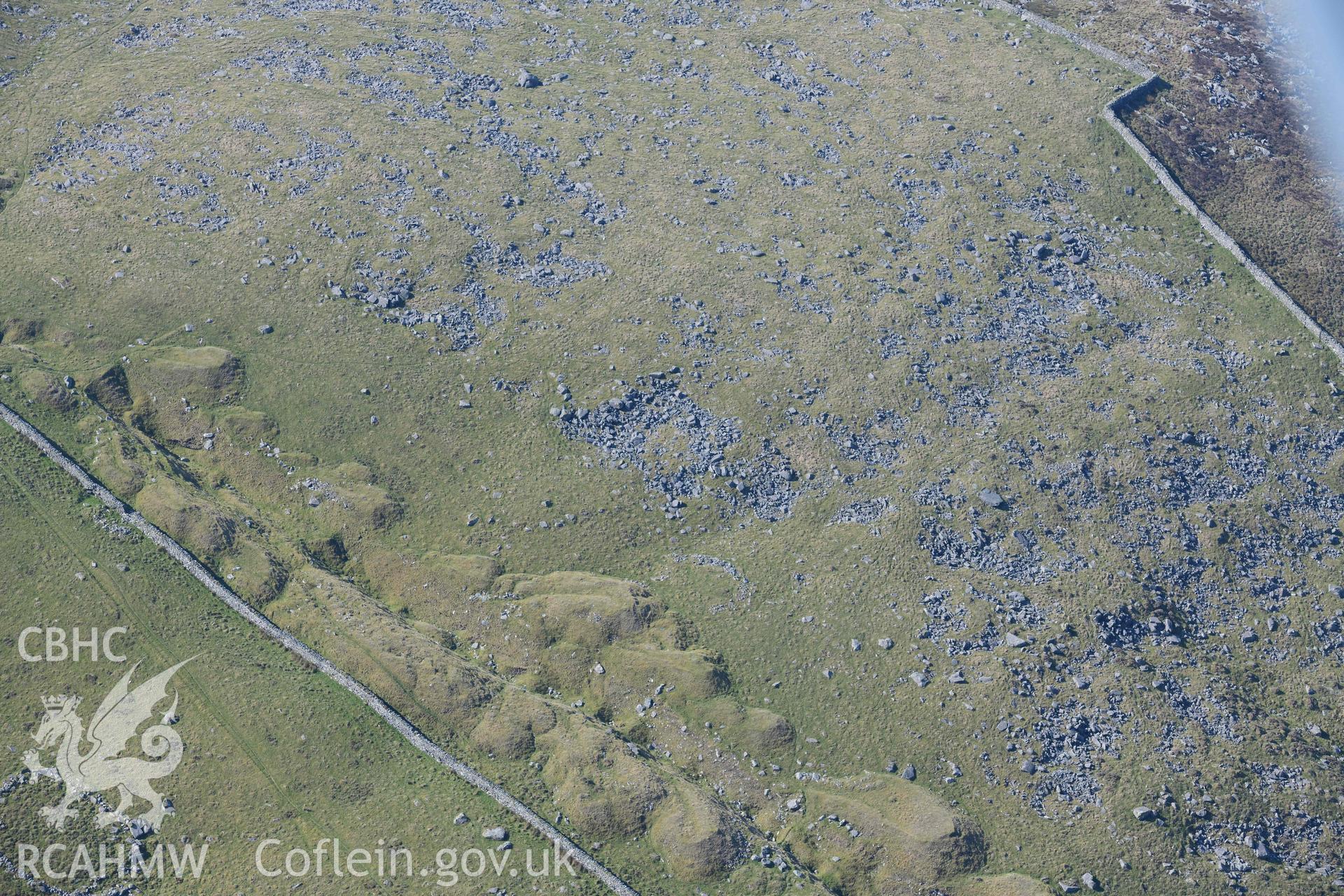 Bwlch Cwmmaria, varied settlement features and enclosures, detail of mining cut. Oblique aerial photographs taken during the Royal Commission’s programme of archaeological aerial reconnaissance by Toby Driver on 25 March 2022.