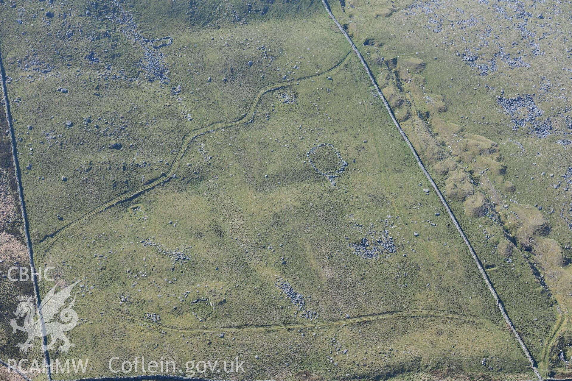 Bwlch Cwmmaria, varied settlement features and enclosures. Oblique aerial photographs taken during the Royal Commission’s programme of archaeological aerial reconnaissance by Toby Driver on 25 March 2022.