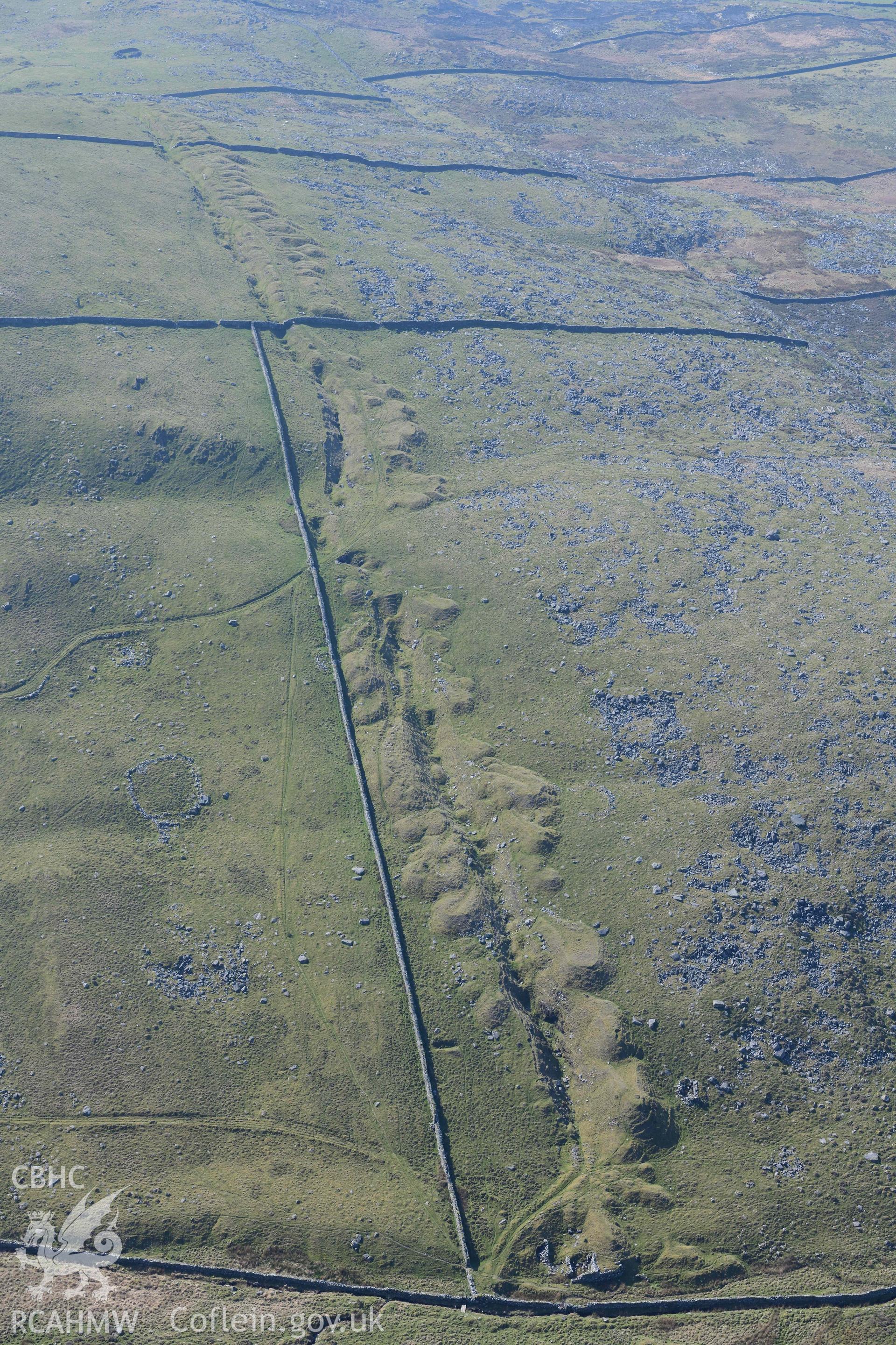 Bwlch Cwmmaria, varied settlement features and enclosures, view looking south. Oblique aerial photographs taken during the Royal Commission’s programme of archaeological aerial reconnaissance by Toby Driver on 25 March 2022.