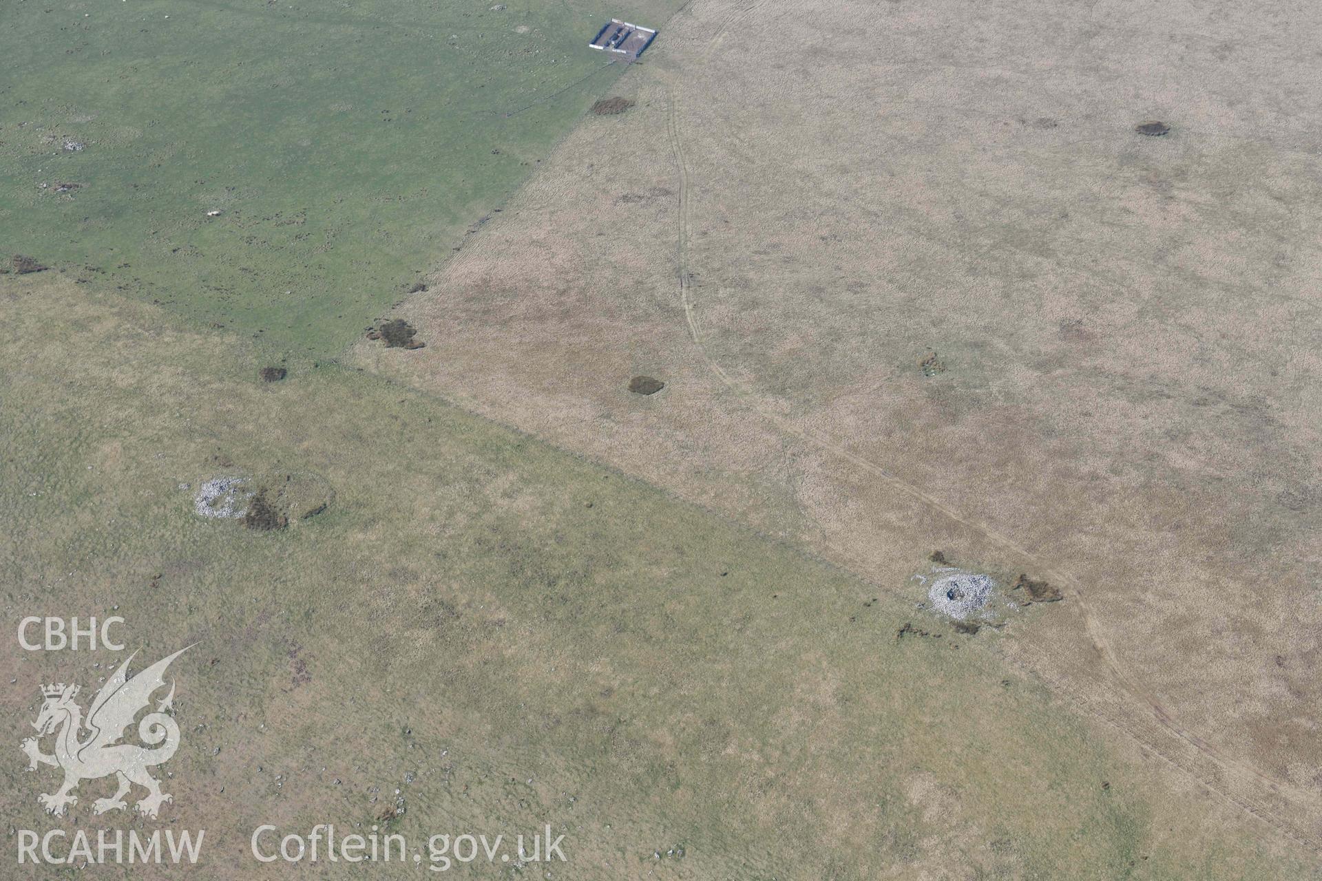 Allt Lwyd pair of cairns. Oblique aerial photographs taken during the Royal Commission’s programme of archaeological aerial reconnaissance by Toby Driver on 25 March 2022.