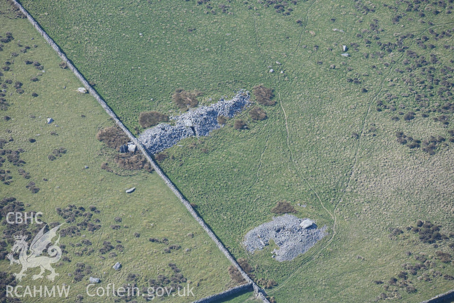 Carneddau Hengwm, chambered long cairns. Oblique aerial photograph taken during the Royal Commission’s programme of archaeological aerial reconnaissance by Toby Driver on 25 March 2022.