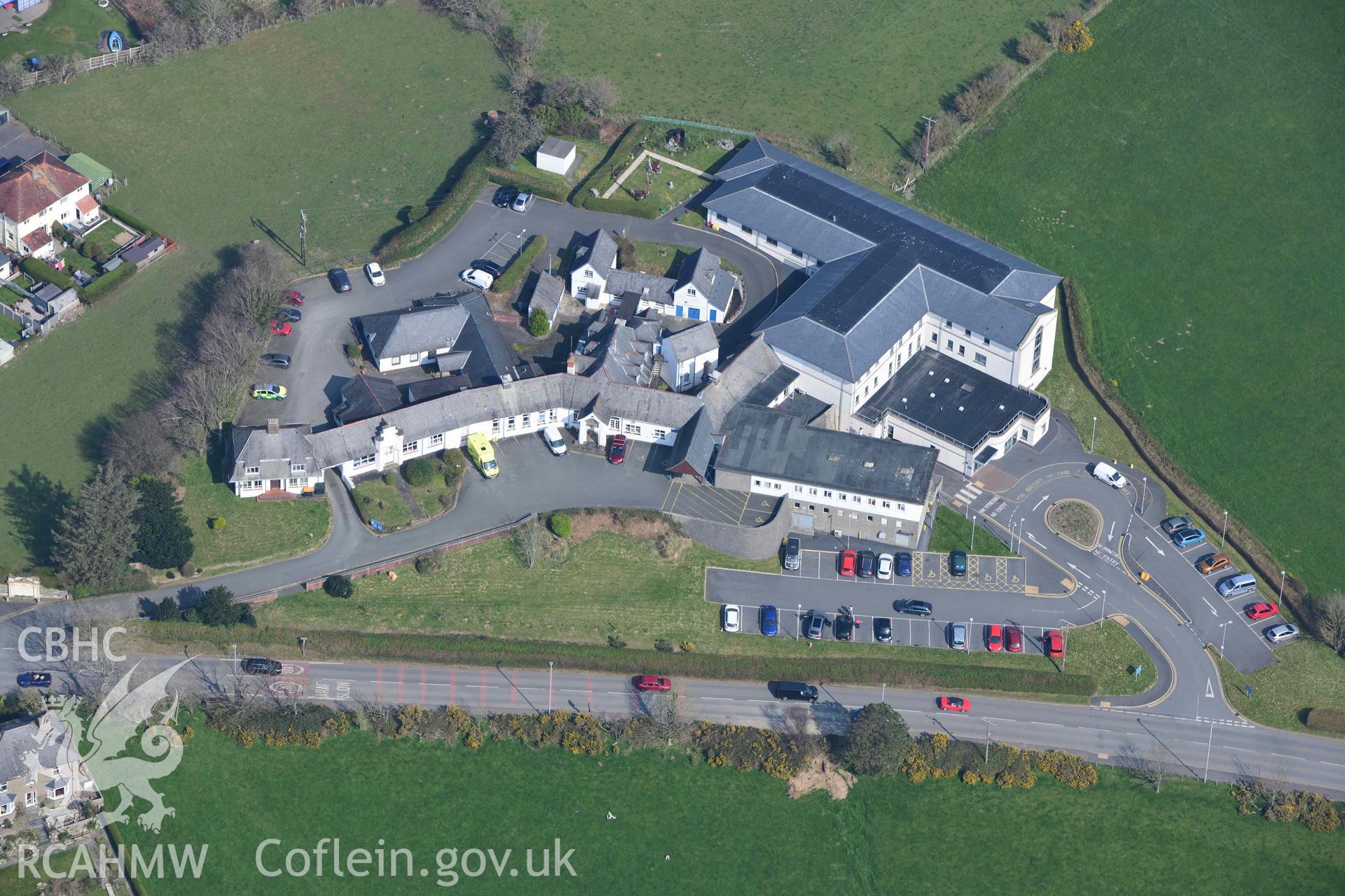 Tywyn Hospital. Oblique aerial photograph taken during the Royal Commission’s programme of archaeological aerial reconnaissance by Toby Driver on 25 March 2022.