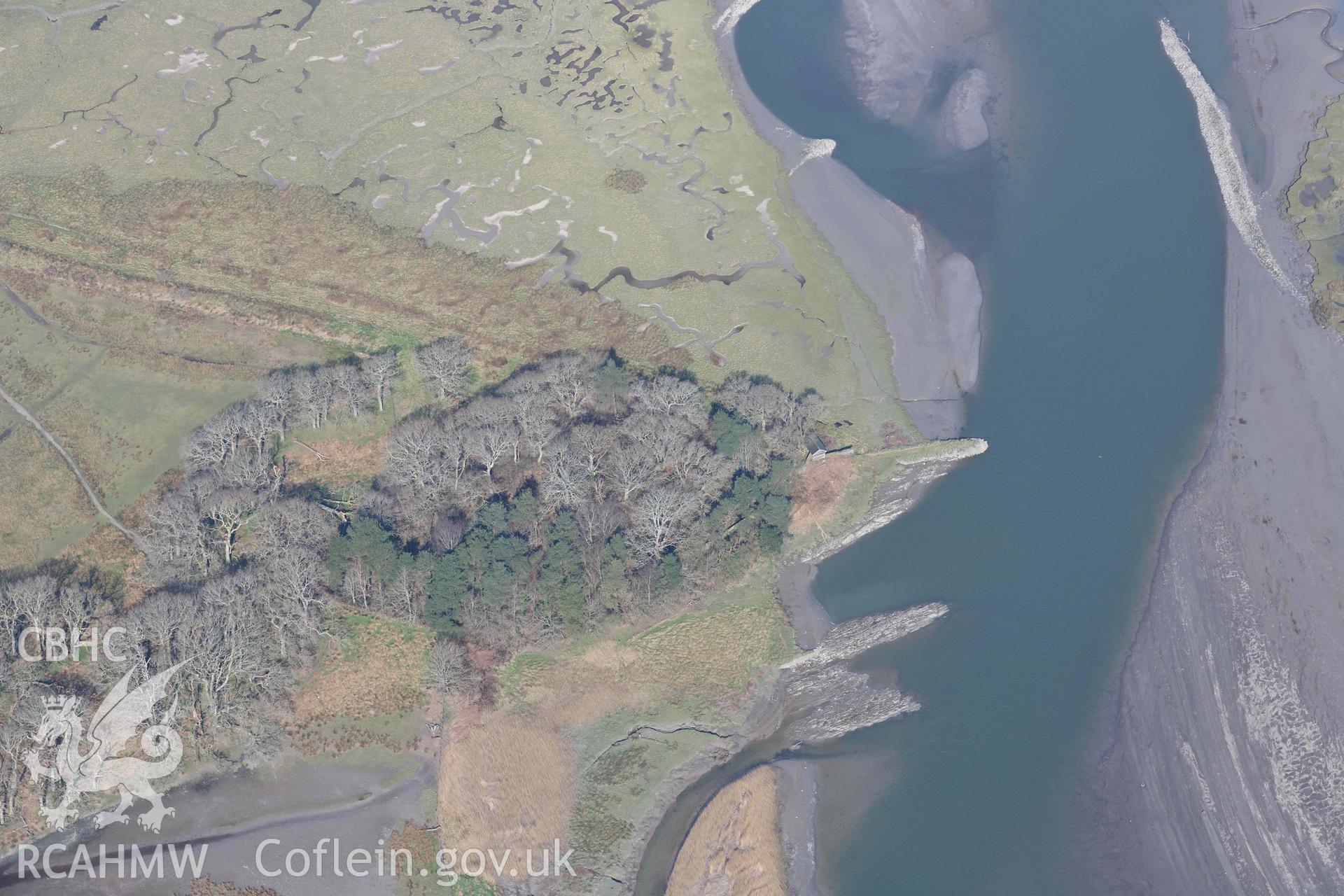 Domen Las motte. Oblique aerial photograph taken during the Royal Commission’s programme of archaeological aerial reconnaissance by Toby Driver on 25 March 2022.