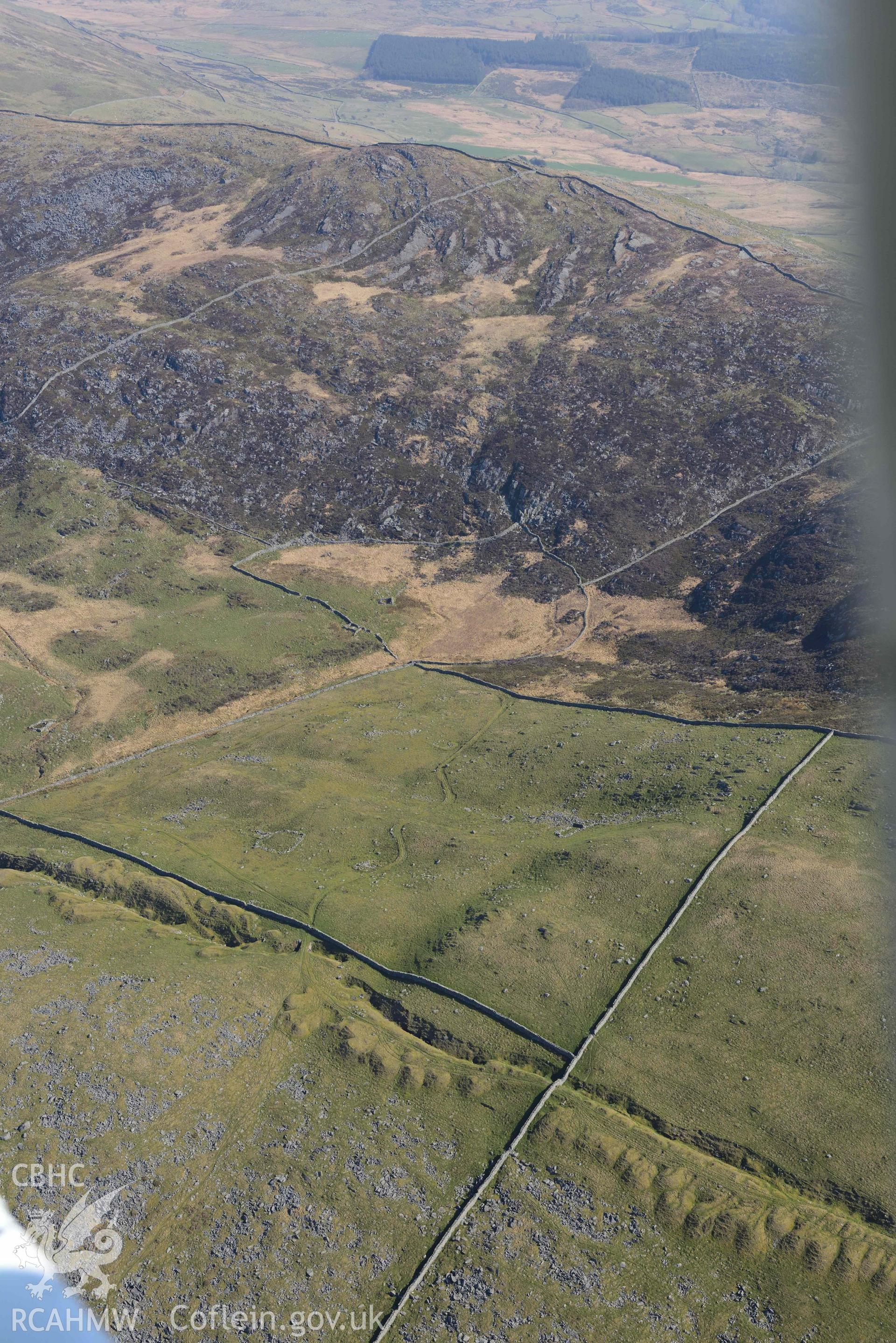 Ergyn and Hafotty manganese mines, view from the west. Oblique aerial photograph taken during the Royal Commission’s programme of archaeological aerial reconnaissance by Toby Driver on 25 March 2022.