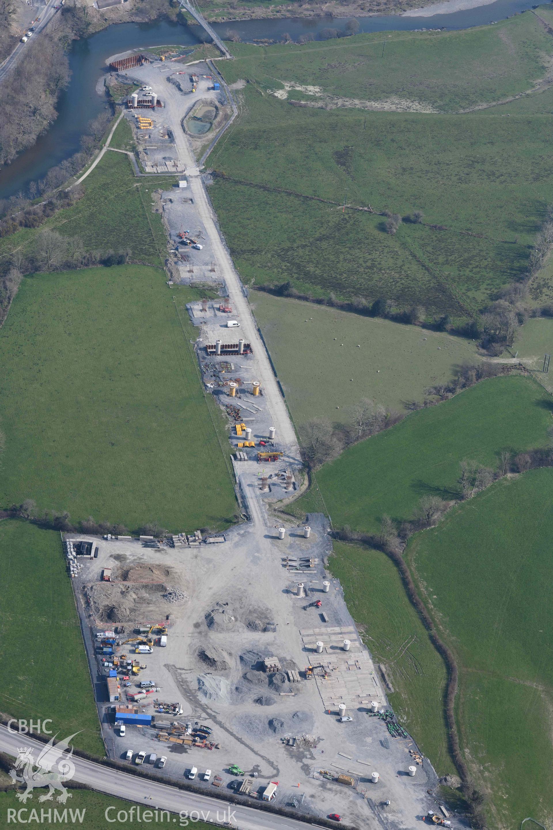 A487 New Dyfi Bridge under construction. Oblique aerial photograph taken during the Royal Commission’s programme of archaeological aerial reconnaissance by Toby Driver on 25 March 2022.