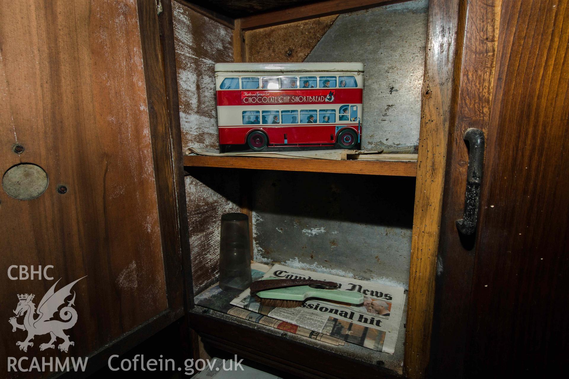 Llawrcwmbach: cupboard and tin bus