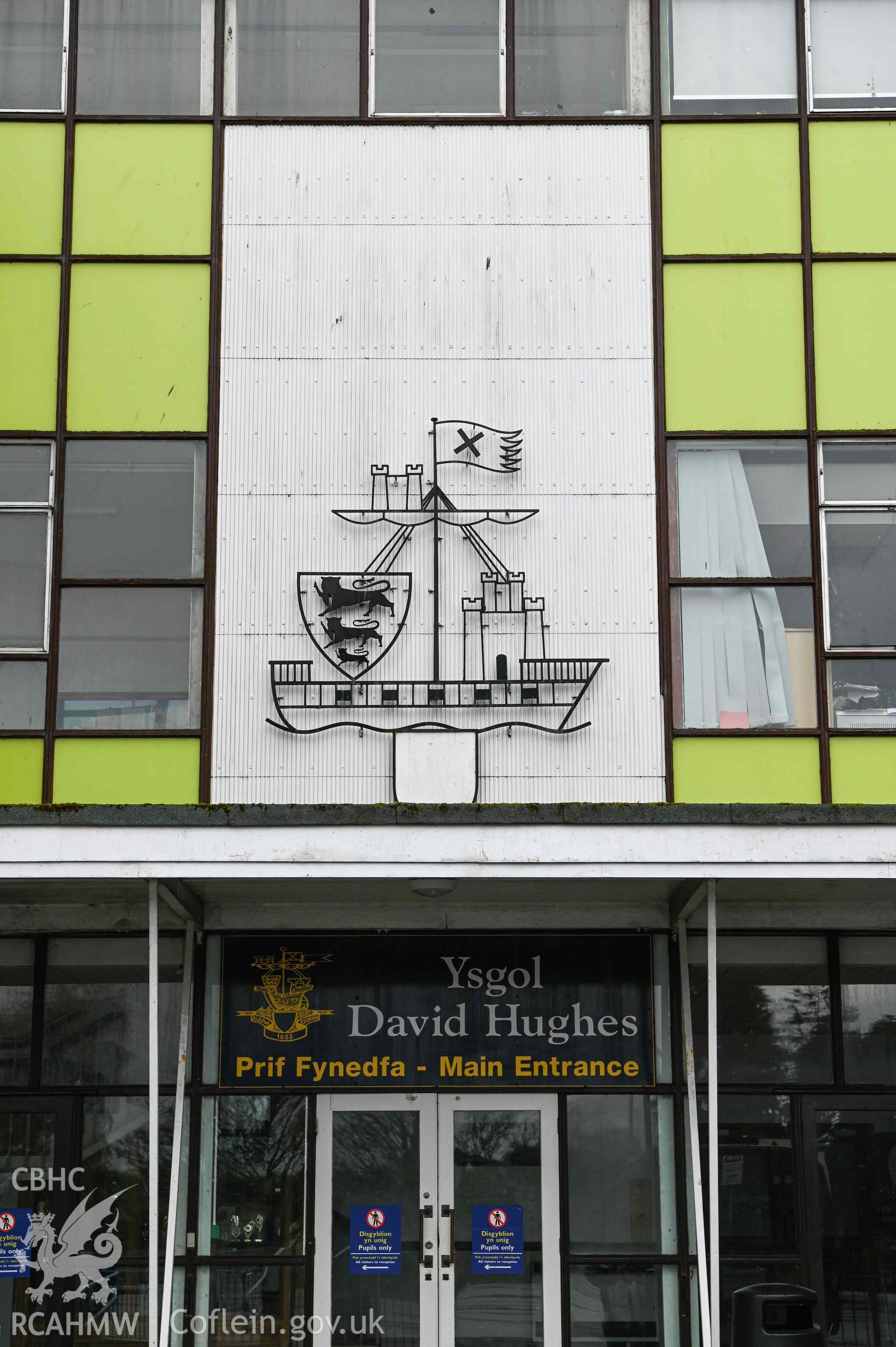 Main entrance, and emblem. Portrait. Ysgol David Hughes