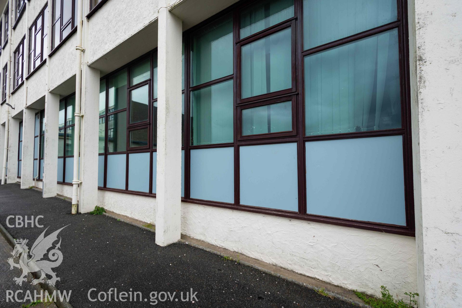 Forward wall pillars, glazing and panels. Ysgol David Hughes