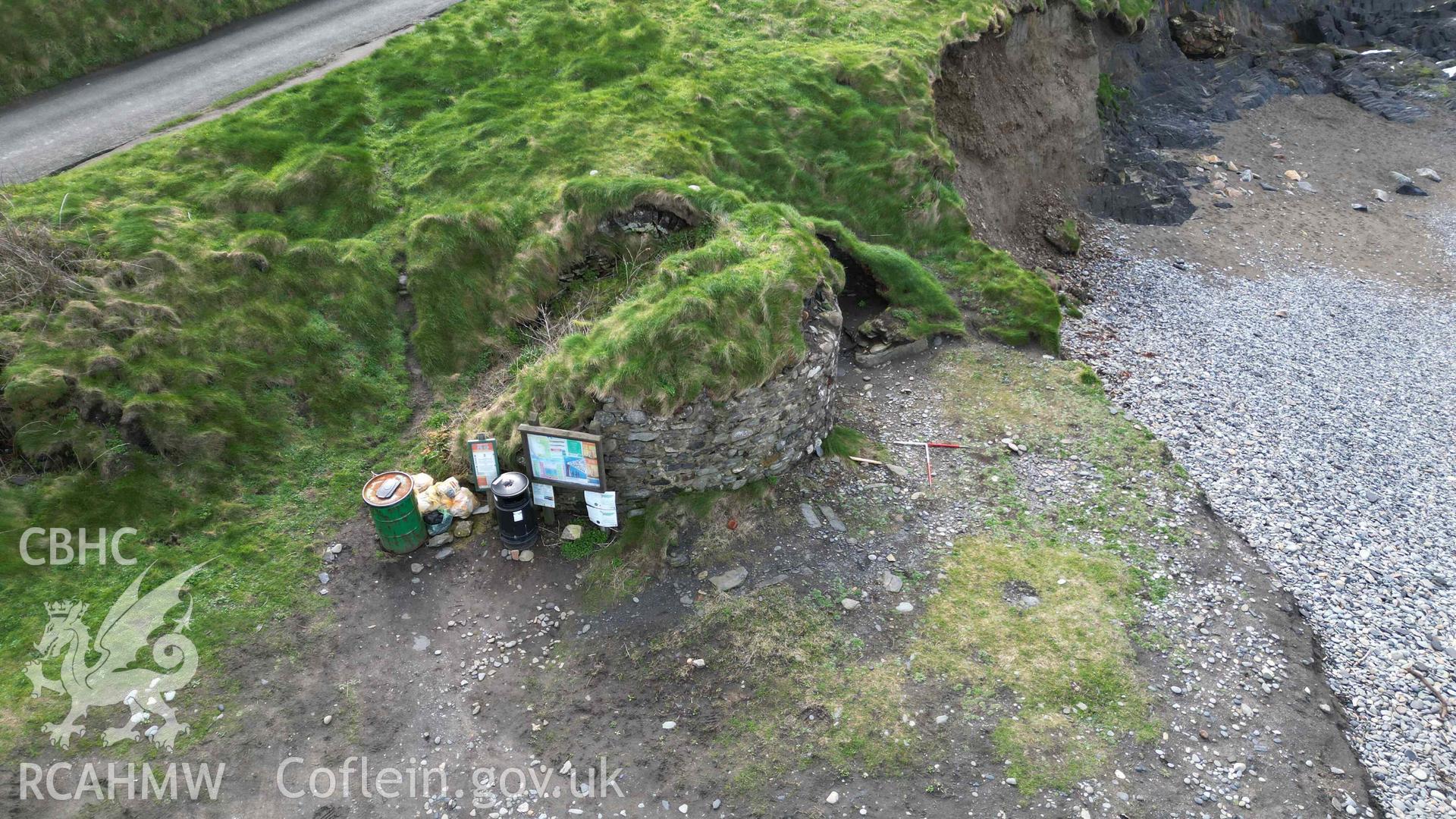 Oblique view, looking south, of Abereiddy Lime Kiln 1 on 20/03/2024. Scales are 1m.