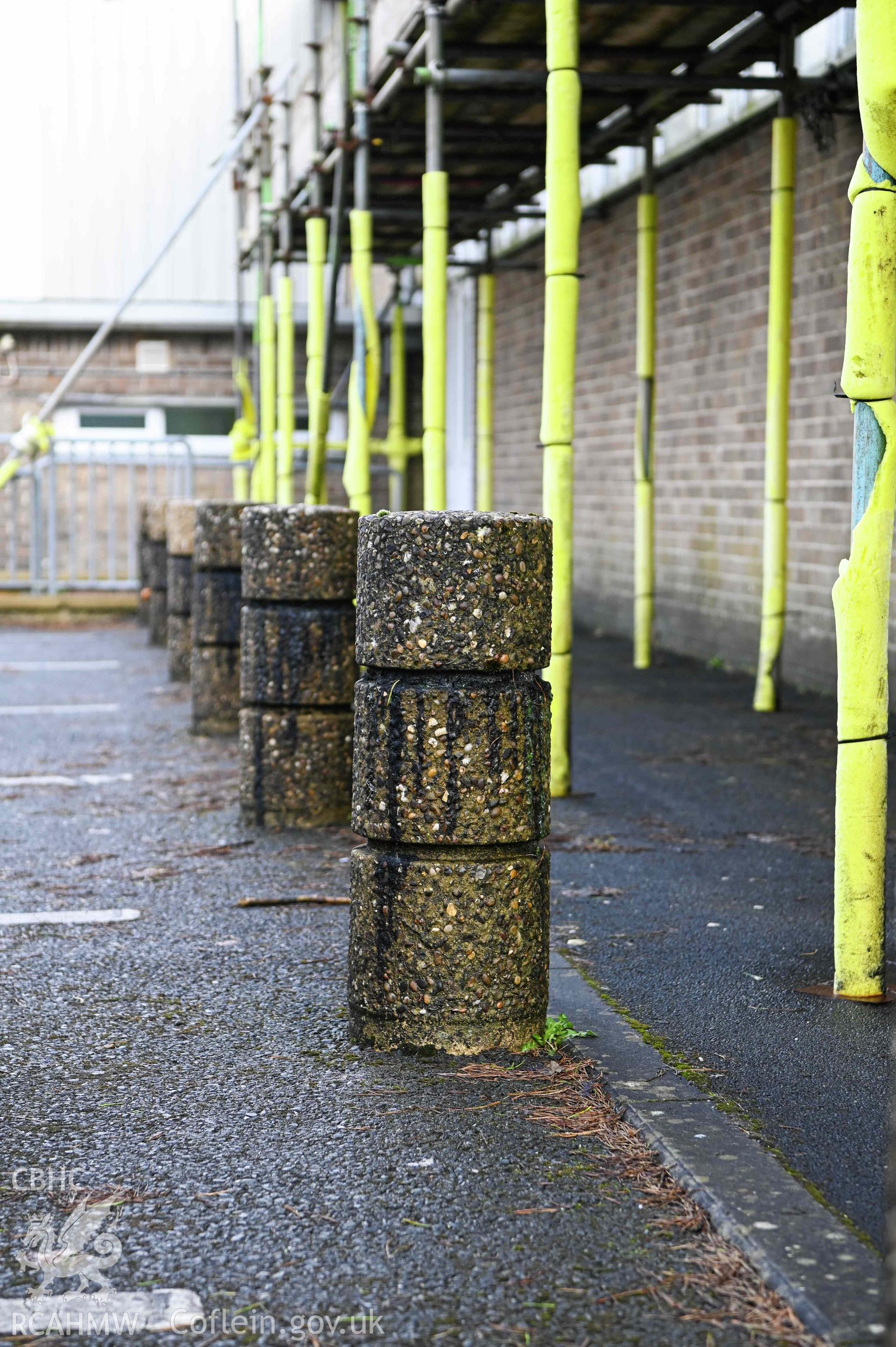 Pebbledashed concrete bollards. Ysgol Bro Preseli