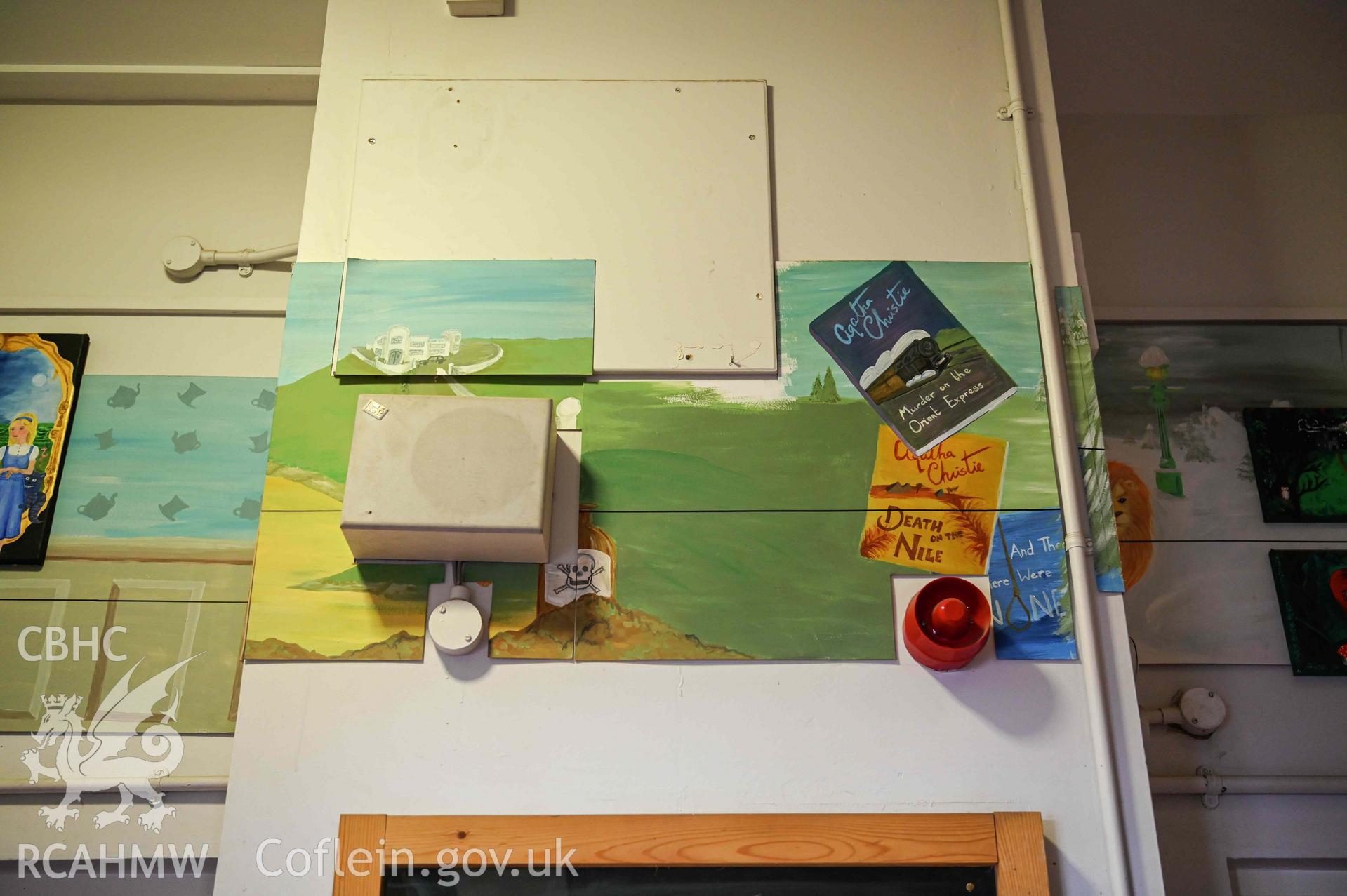 Literature artwork (Agatha Christie) above doorways, first floor tower block. Ysgol Bro Preseli