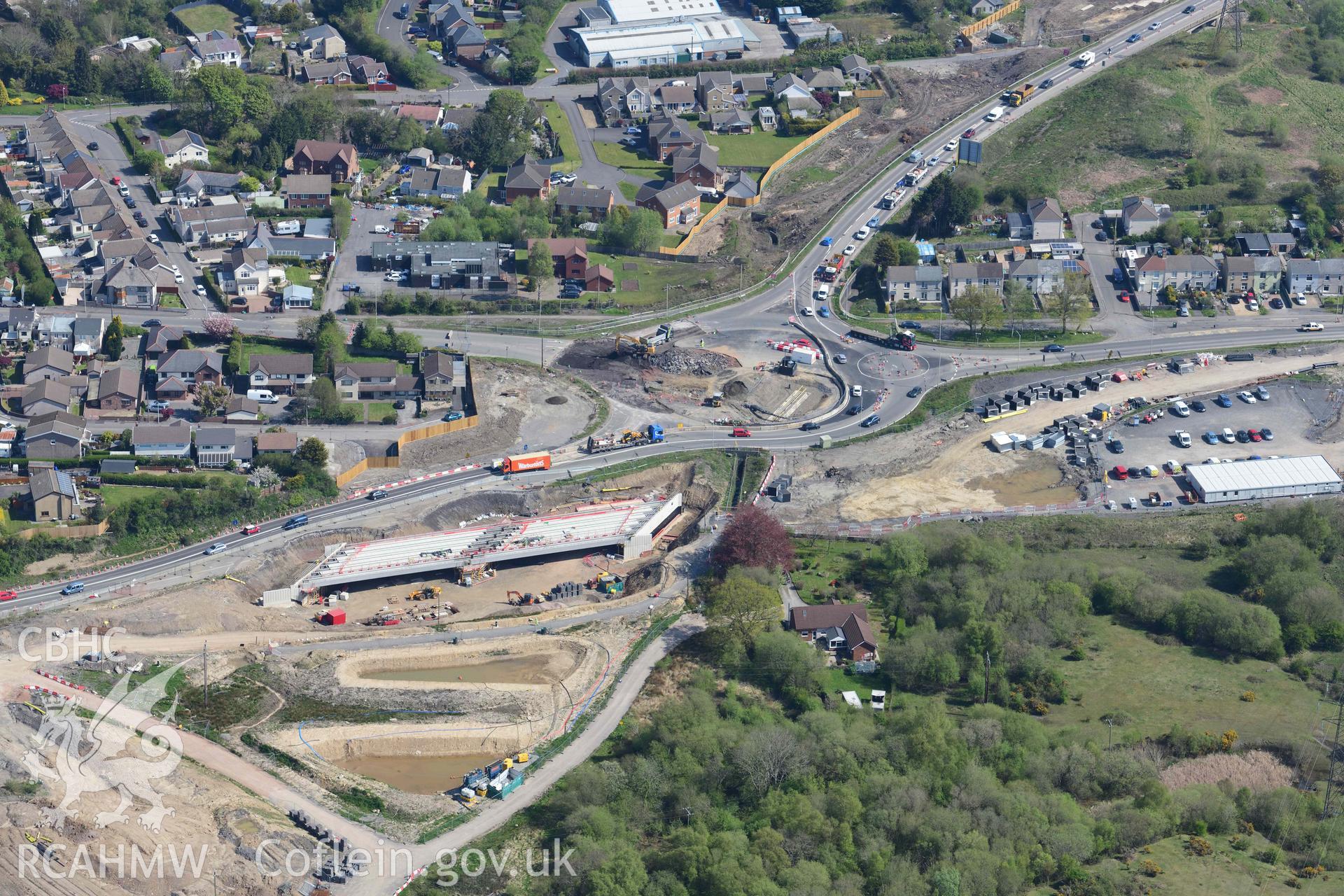A465 road improvements, Hirwaun, detail of roundabout engineering. Oblique aerial photograph taken during the Royal Commission's programme of archaeological aerial reconnaissance by Toby Driver on 29 April 2022.