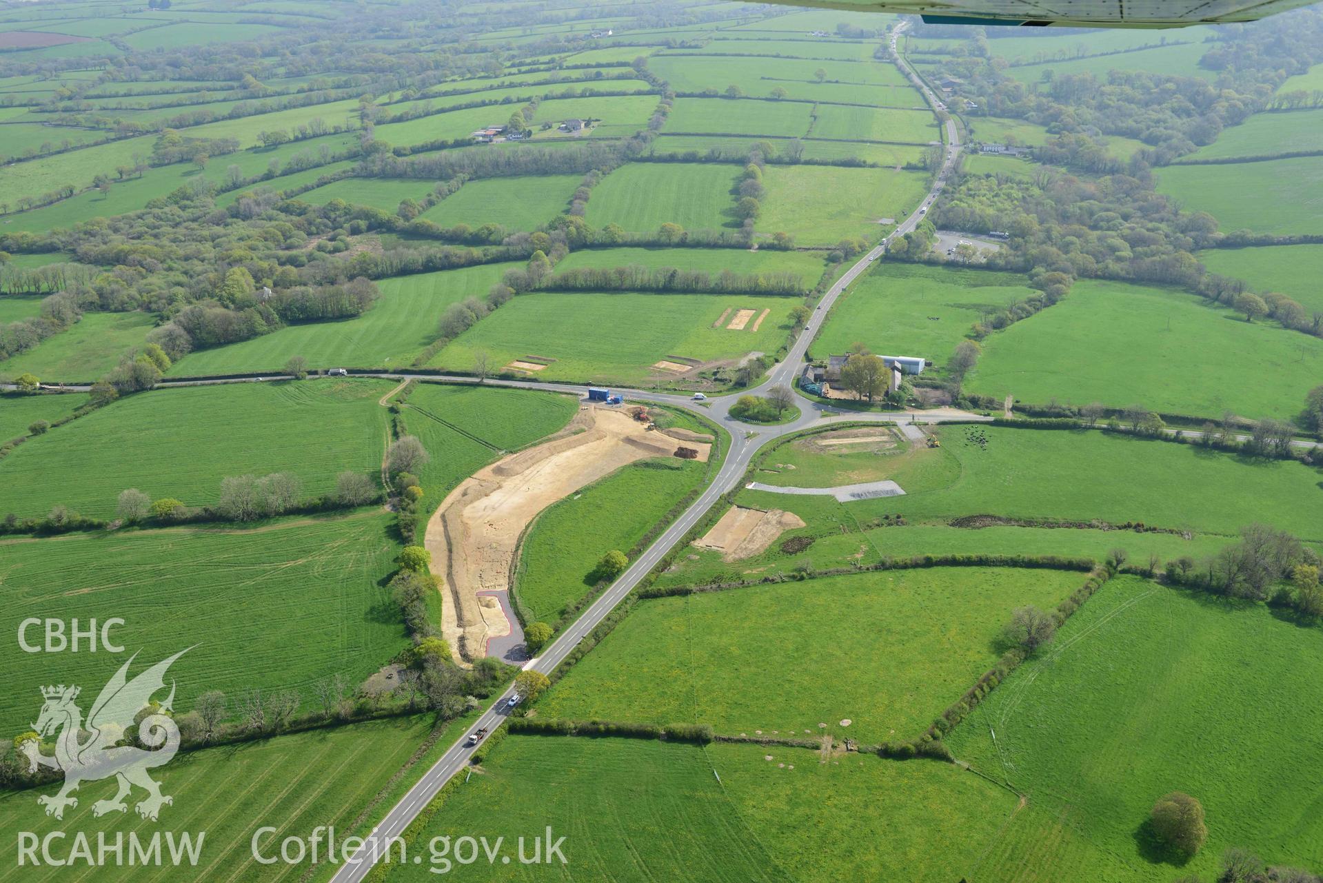 A40 improvement works, Penblewin roundabout. Oblique aerial photograph taken during the Royal Commission's programme of archaeological aerial reconnaissance by Toby Driver on 29 April 2022.
