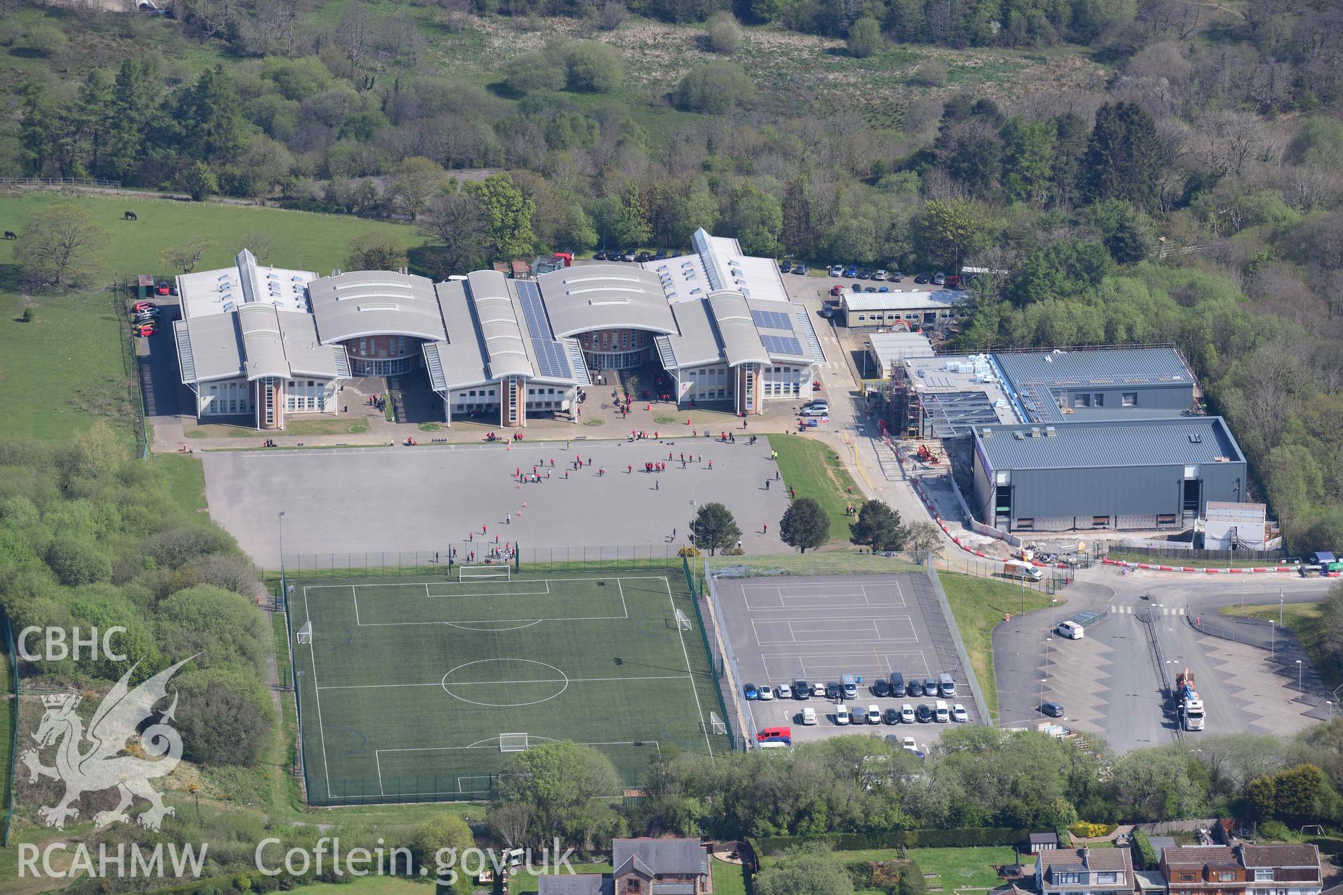 Ysgol Gyfun Rhydywaun, Hirwaun. Oblique aerial photograph taken during the Royal Commission's programme of archaeological aerial reconnaissance by Toby Driver on 29 April 2022.
