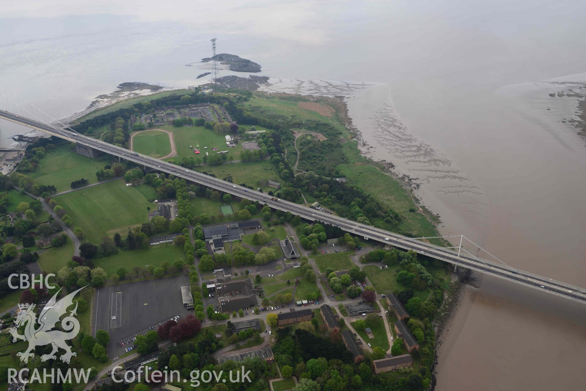 The Severn Bridge, the Wye Bridge and Beachley Barracks (Gloucester). Oblique aerial photograph taken during the Royal Commission's programme of archaeological aerial reconnaissance by Toby Driver on 29 April 2022.
