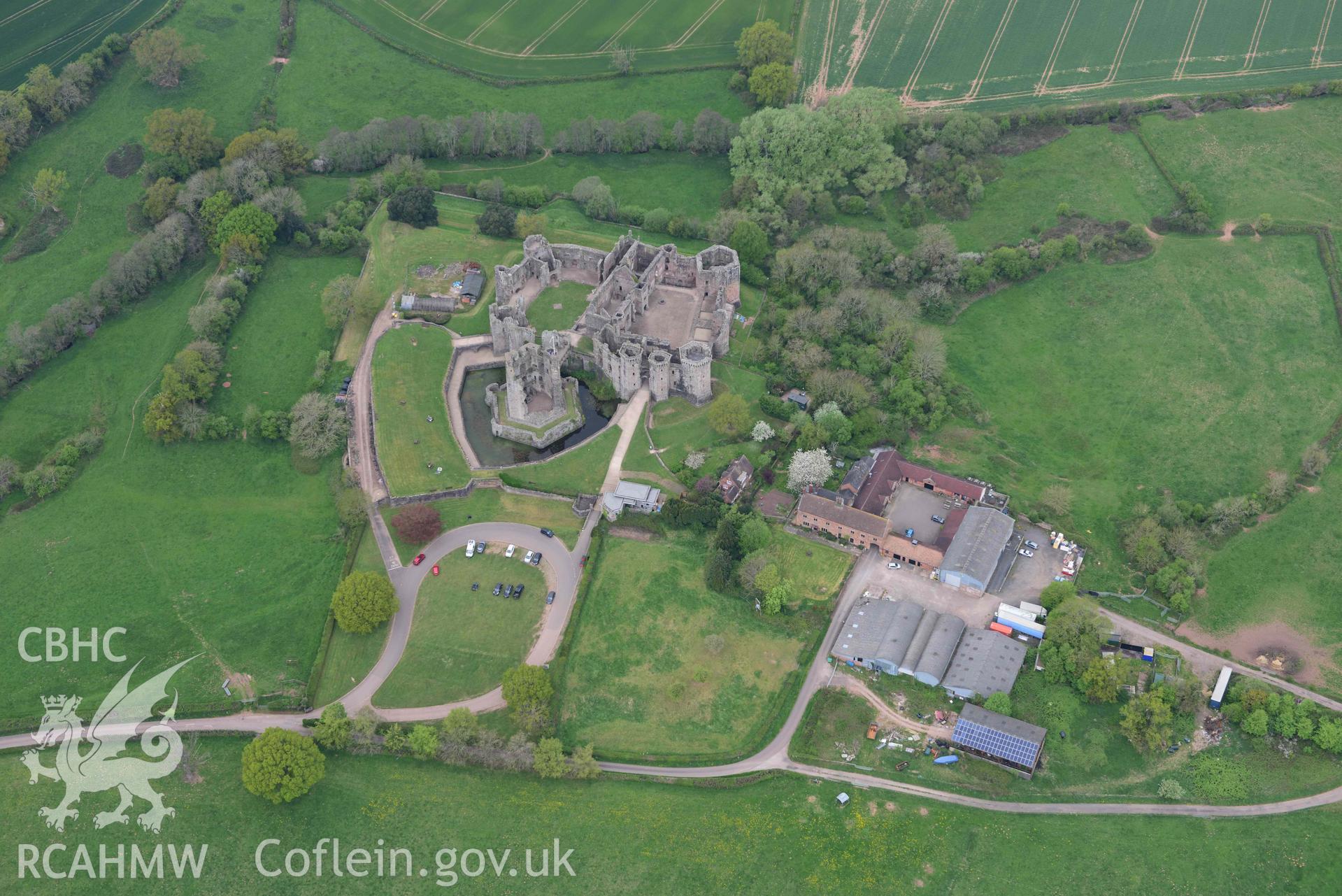 Raglan Castle. Oblique aerial photograph taken during the Royal Commission's programme of archaeological aerial reconnaissance by Toby Driver on 29 April 2022.