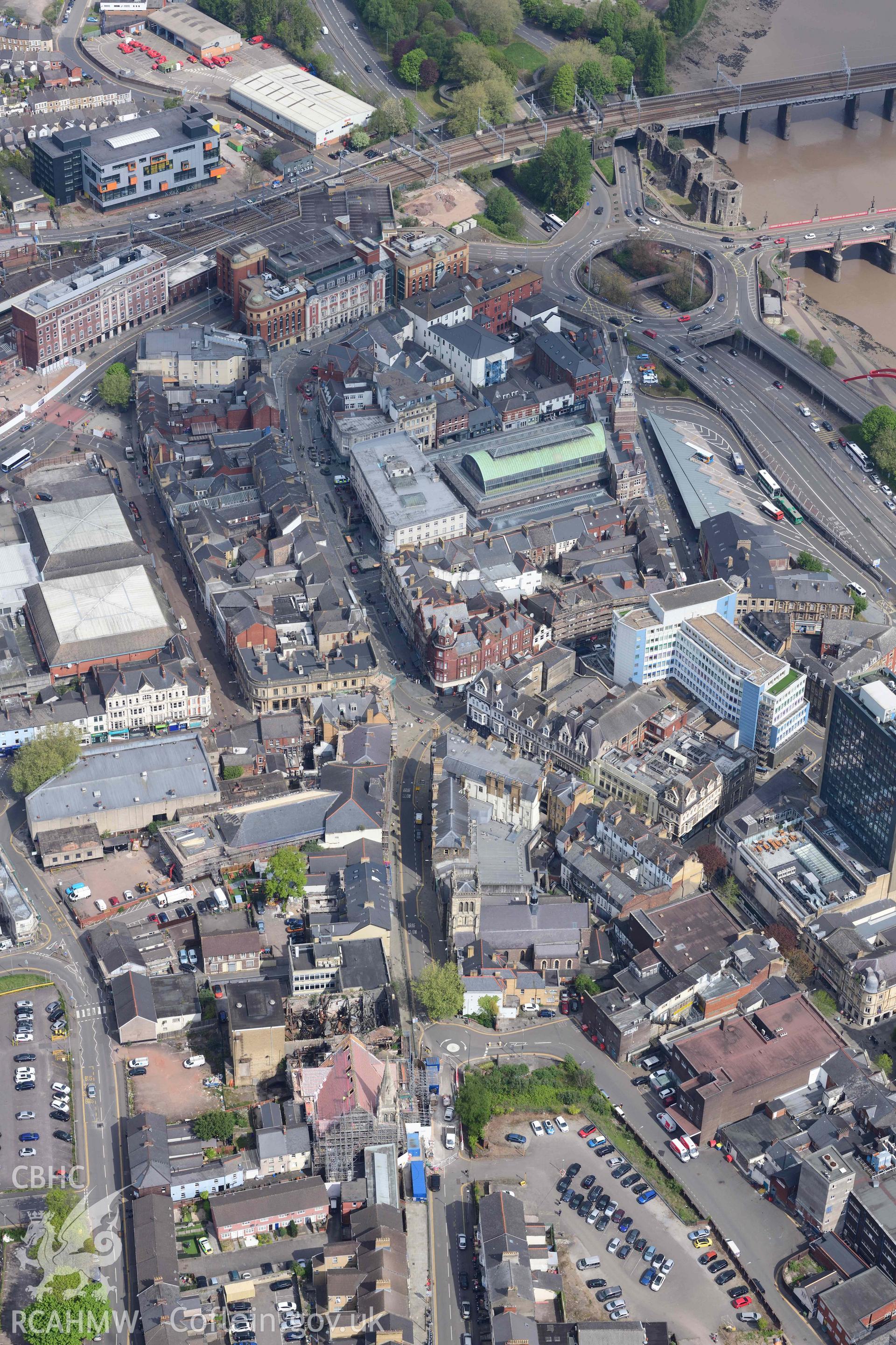 Newport city centre, High Street. Oblique aerial photograph taken during the Royal Commission's programme of archaeological aerial reconnaissance by Toby Driver on 29 April 2022.